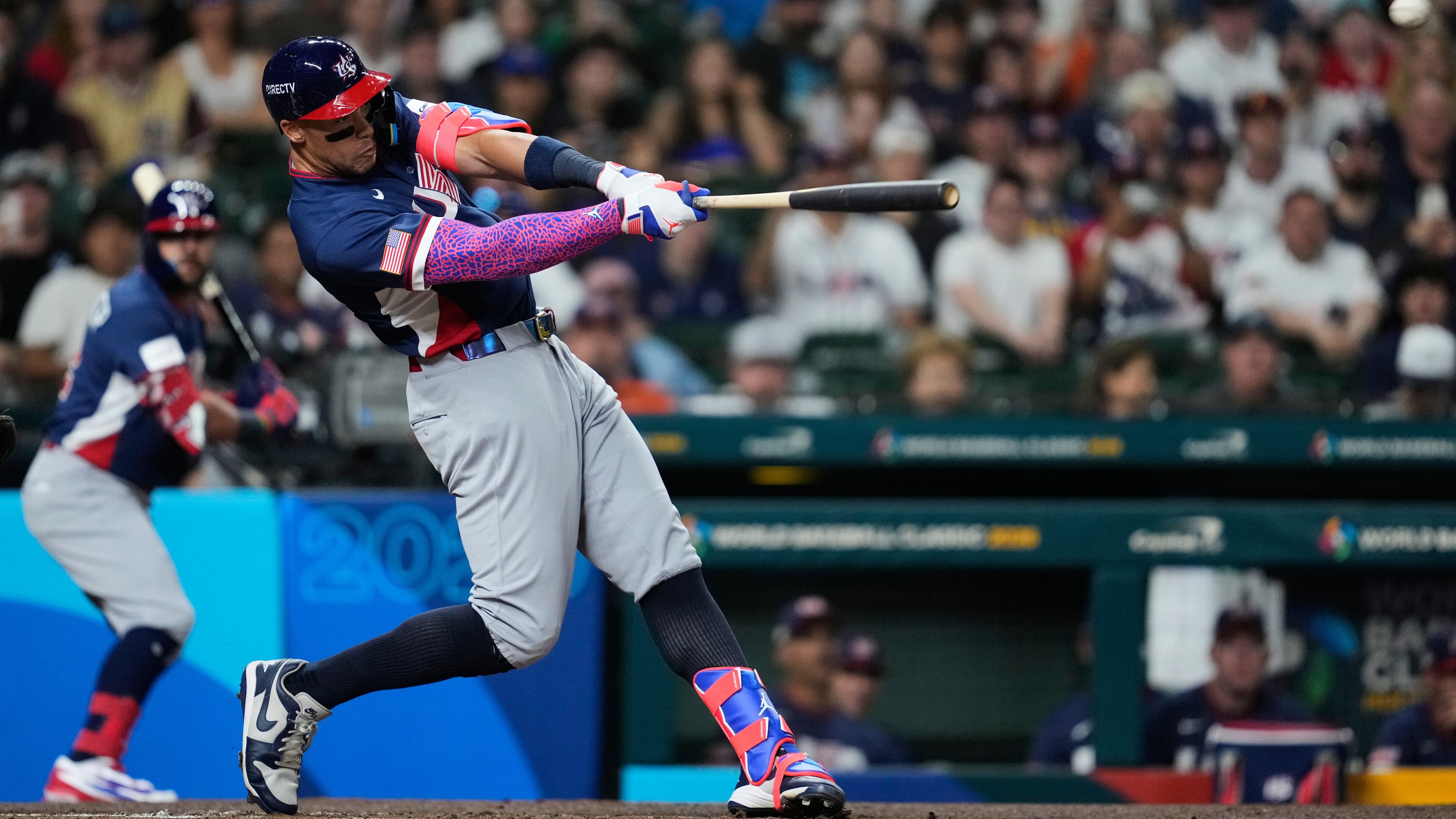 United States' Aaron Judge (99) hits a two-run home run during the first inning of a World Baseball Classic game against Brazil, Friday, March 6, 2026, in Houston. (AP Photo/Ashley Landis)