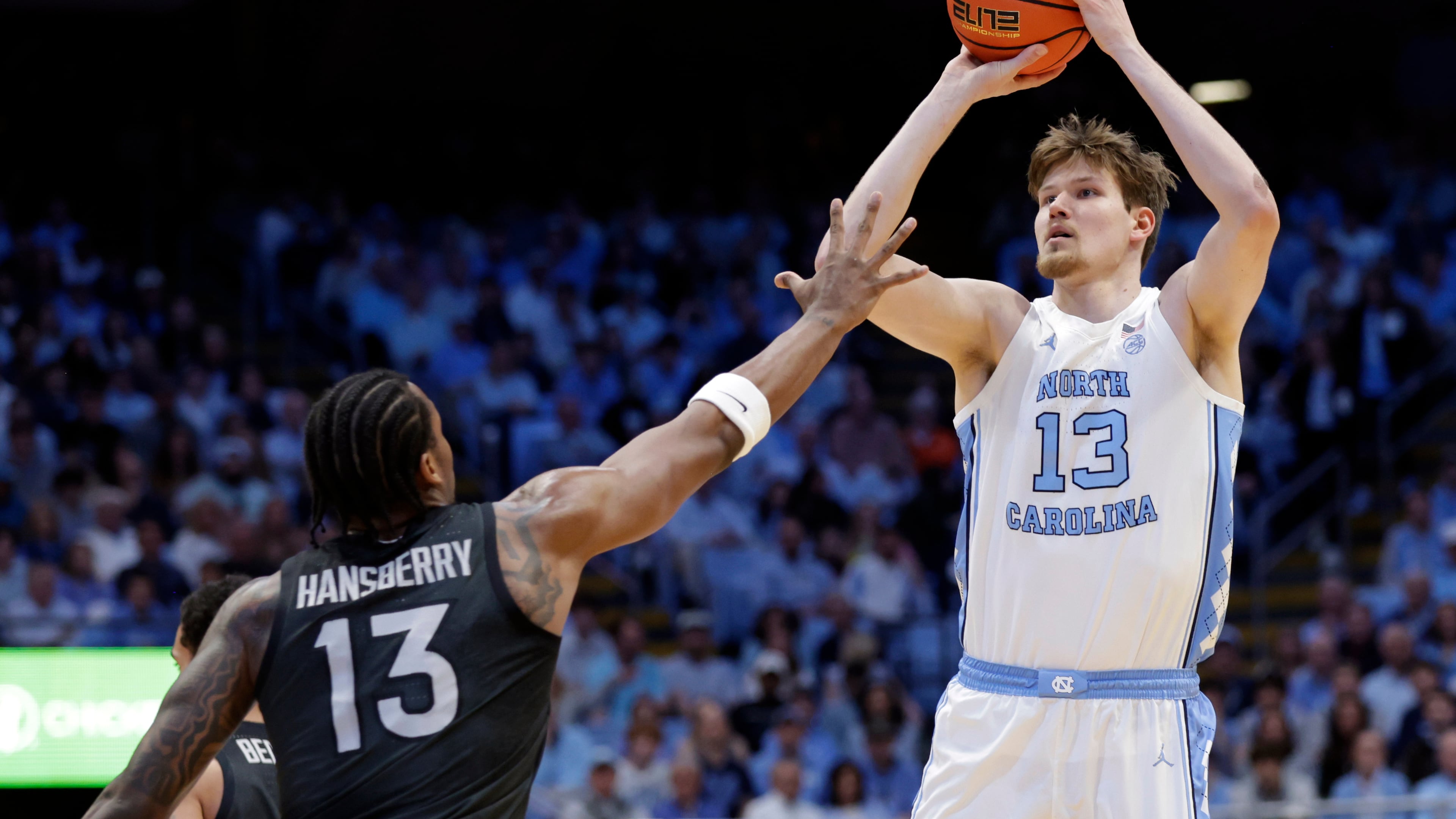 North Carolina center Henri Veesaar (13) shoots as Virginia Tech forward Amani Hansberry (13) defends during the first half of an NCAA college basketball game Saturday, Feb. 28, 2026, in Chapel Hill, N.C. (Chris Seward/AP)