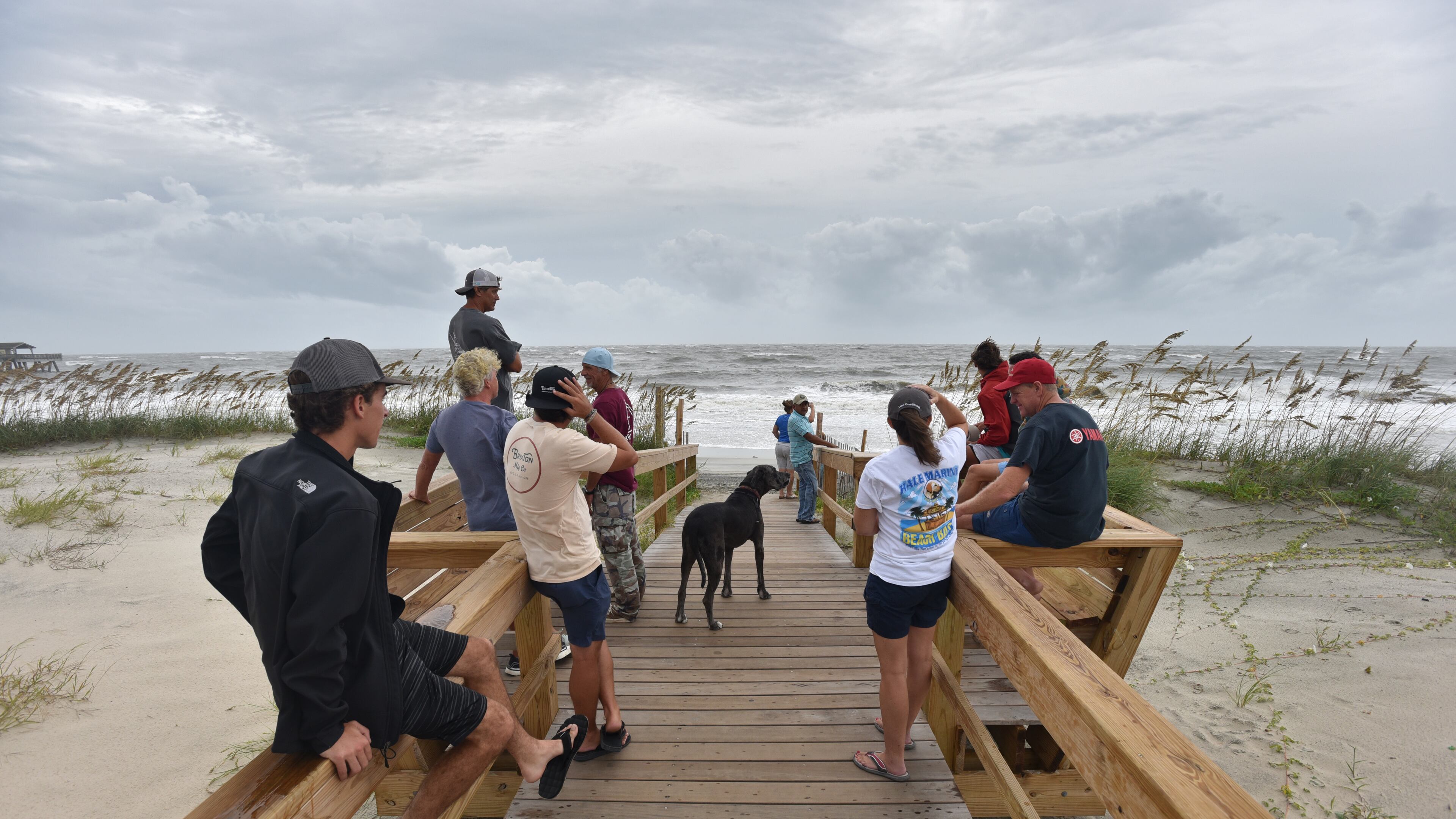 September 4, 2019 Tybee Island - Local residents and beachgoers who decided to stay watch the waves caused by Hurricane Dorian in Tybee Island on Wednesday, September 4, 2019. Gov. Brian Kemp on Wednesday expanded a state of emergency to include nine additional counties as Hurricane Dorianâs outer rain bands reached the Georgia coast. (Hyosub Shin / Hyosub.Shin@ajc.com)