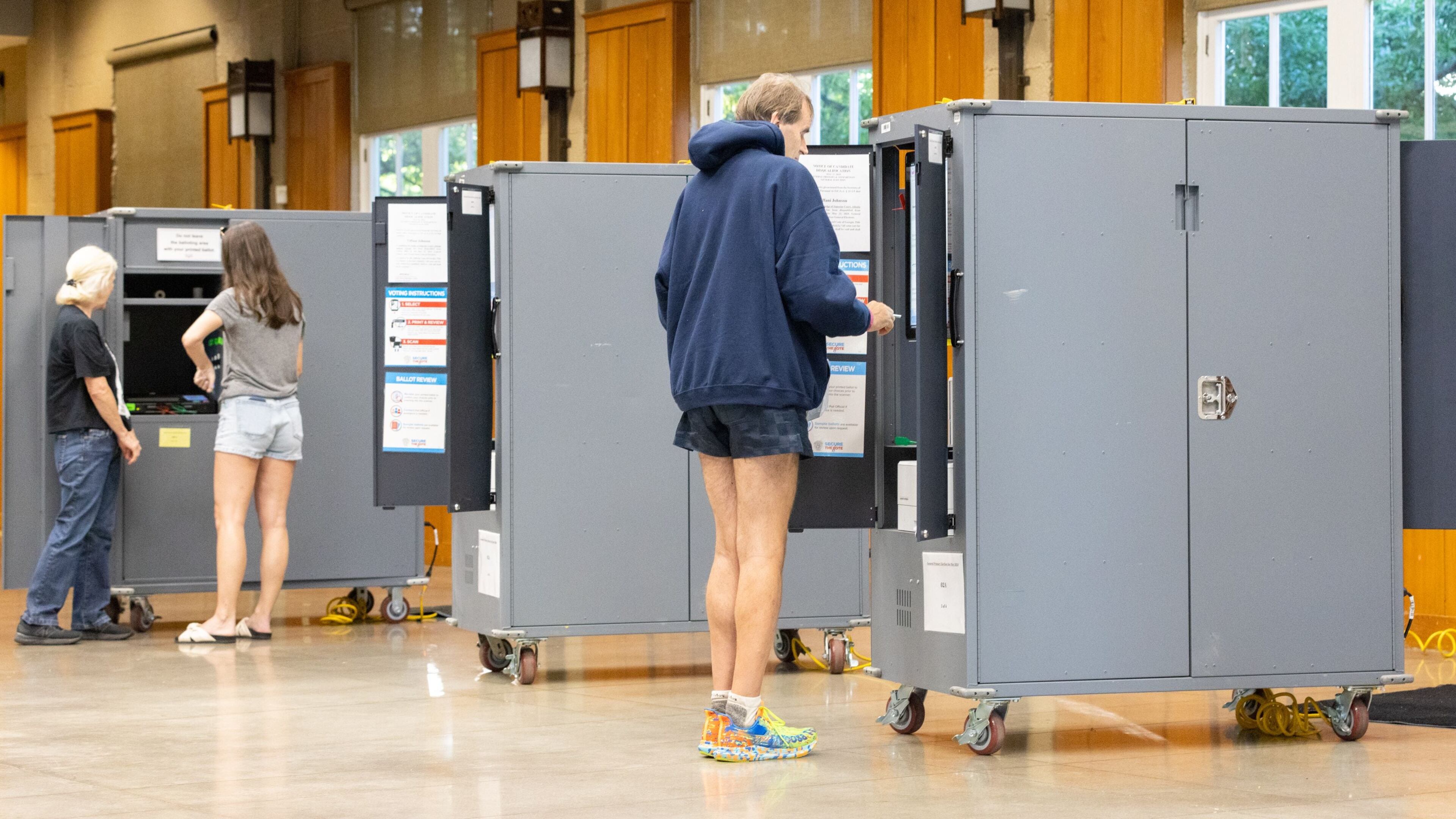 Fulton County residents vote in Georgia's general primary in May at Magnolia Hall in Piedmont Park in Atlanta. The State Election Board will consider oversight of Fulton's elections on Tuesday. (Arvin Temkar/The Atlanta Journal-Constitution)