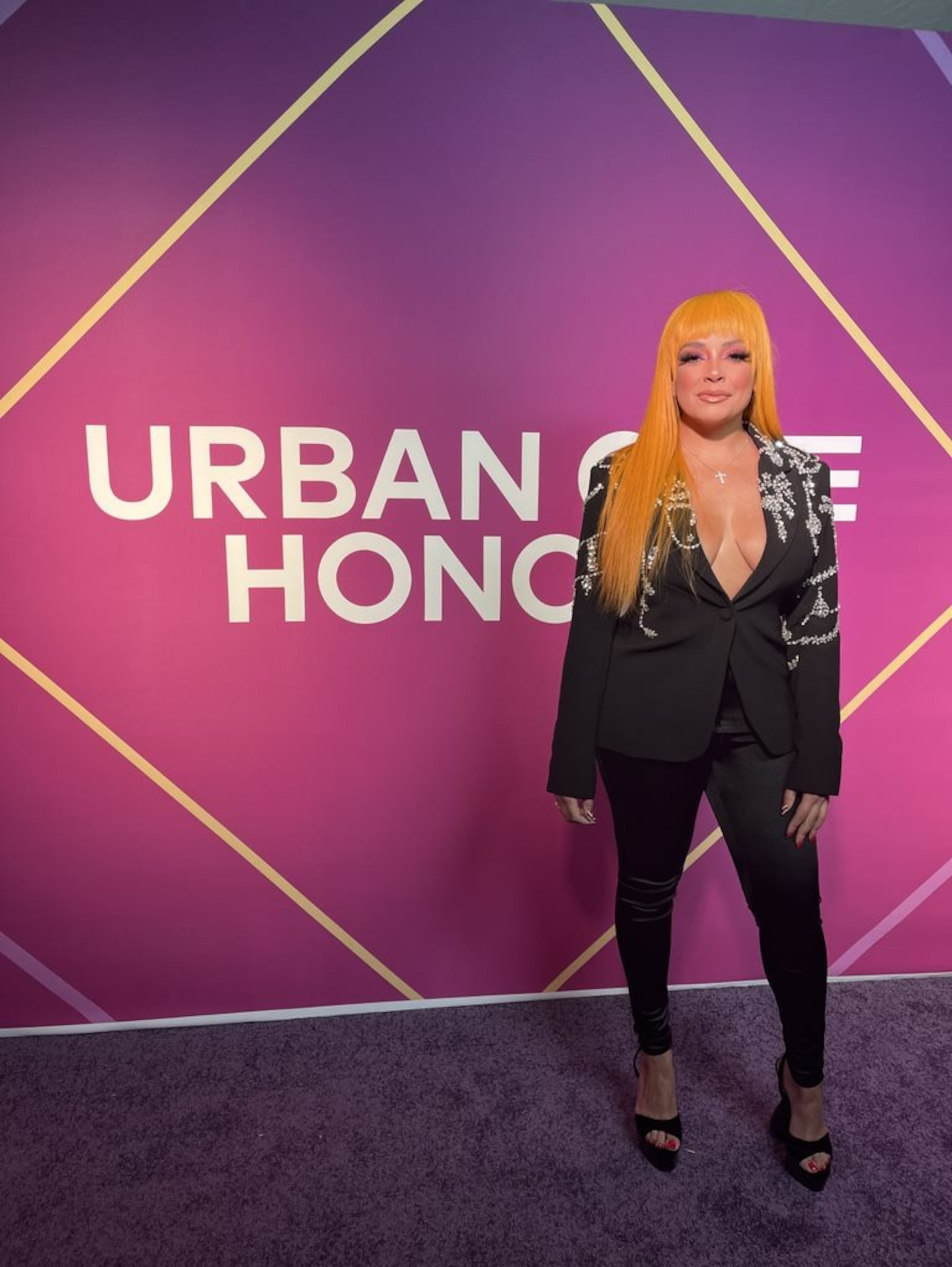 Lore'l of The Morning Hustle at the Urban One Honors red carpet (2022)