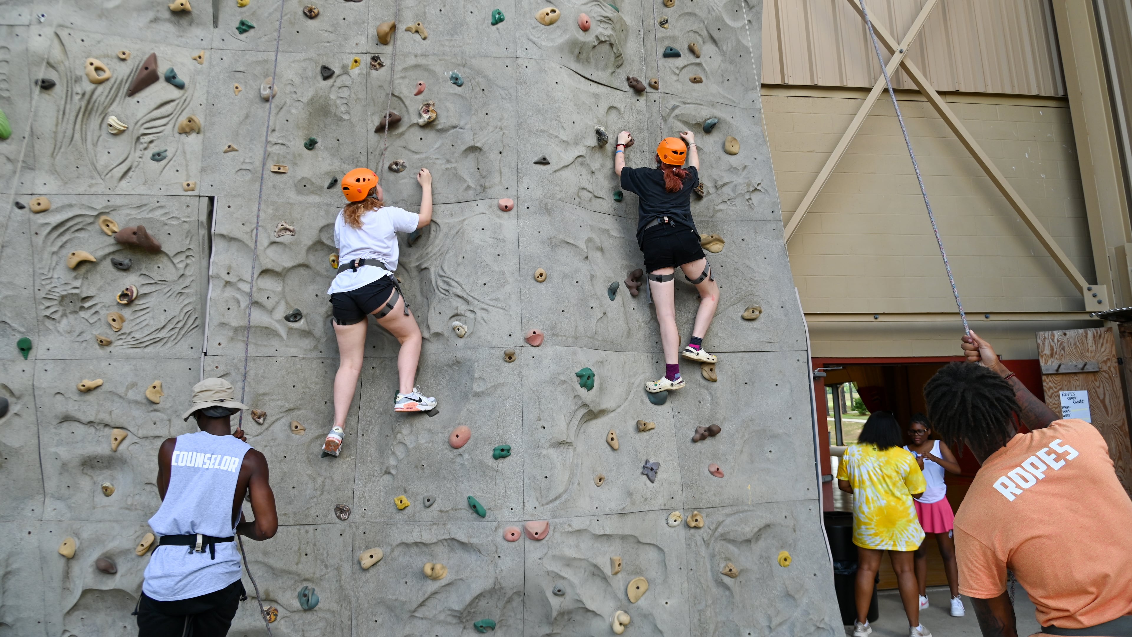 Campers climb the rock wall at a recent session of Camp Kudzu for kids and teens with Type 1 diabetes. Jennie Clayton/Special to the AJC