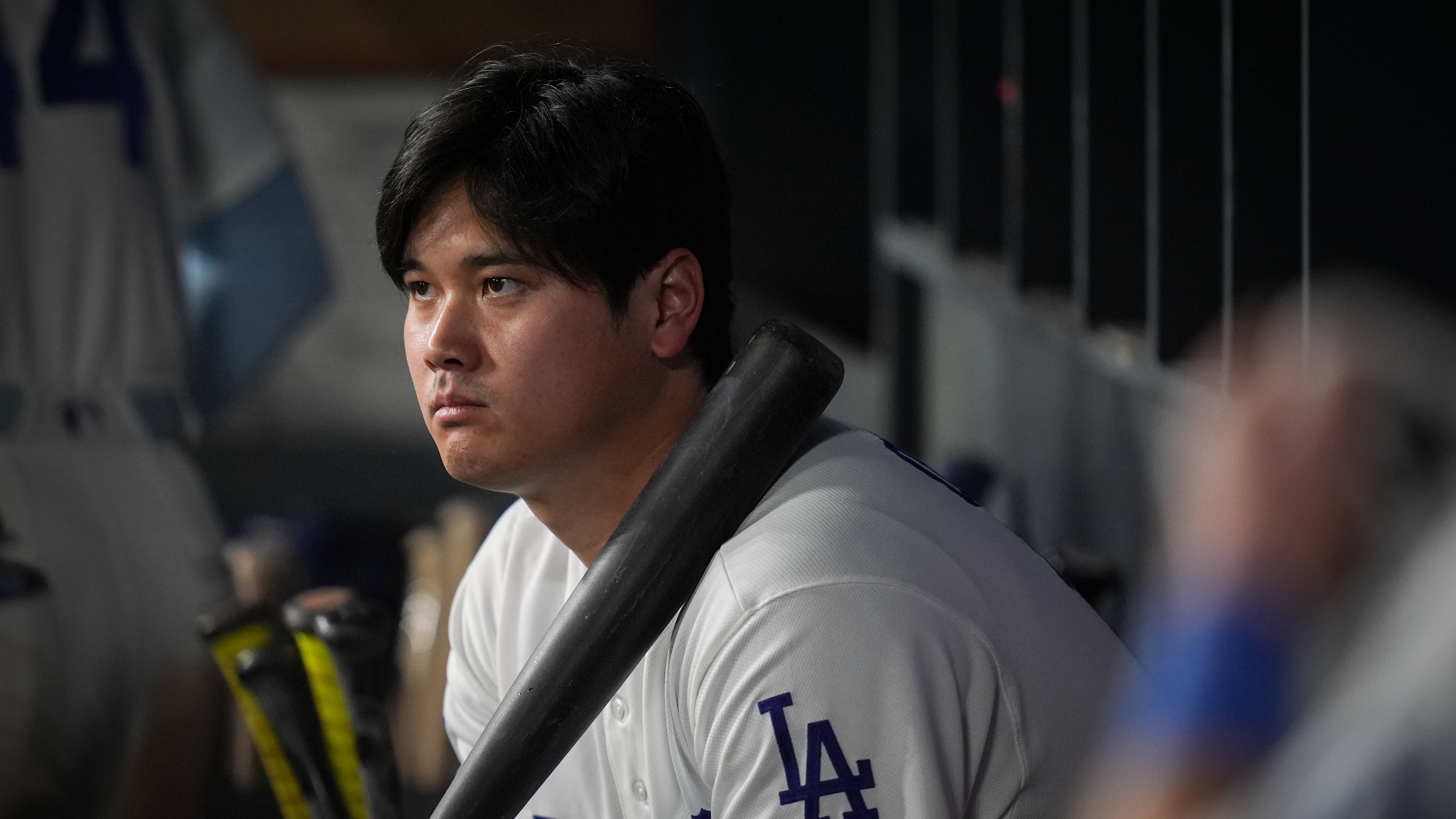 Los Angeles Dodgers designated hitter Shohei Ohtani watches from the dugout during the ninth inning of Game 4 of baseball's National League Championship Series between the Milwaukee Brewers and the Los Angeles Dodgers, Thursday, Oct. 15, 2026, in Los Angeles. (AP Photo/Gregory Bull)