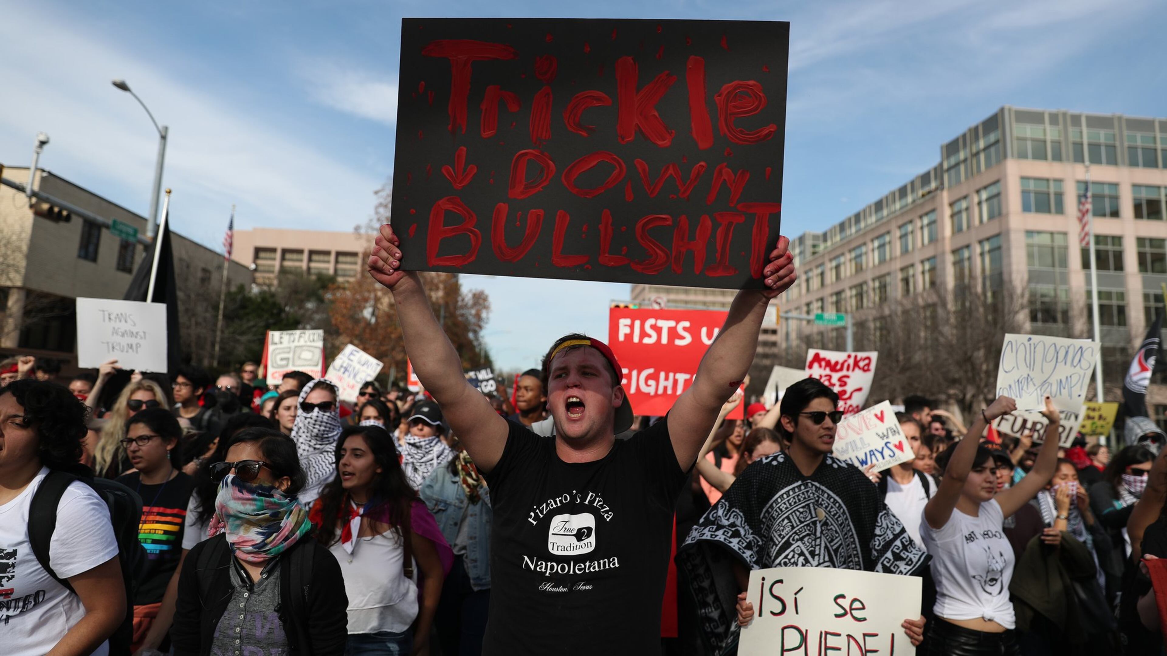 People protesting President Trump march through the UT campus on Inauguration Day Friday. RICARDO B. BRAZZIELL/AMERICAN-STATESMAN