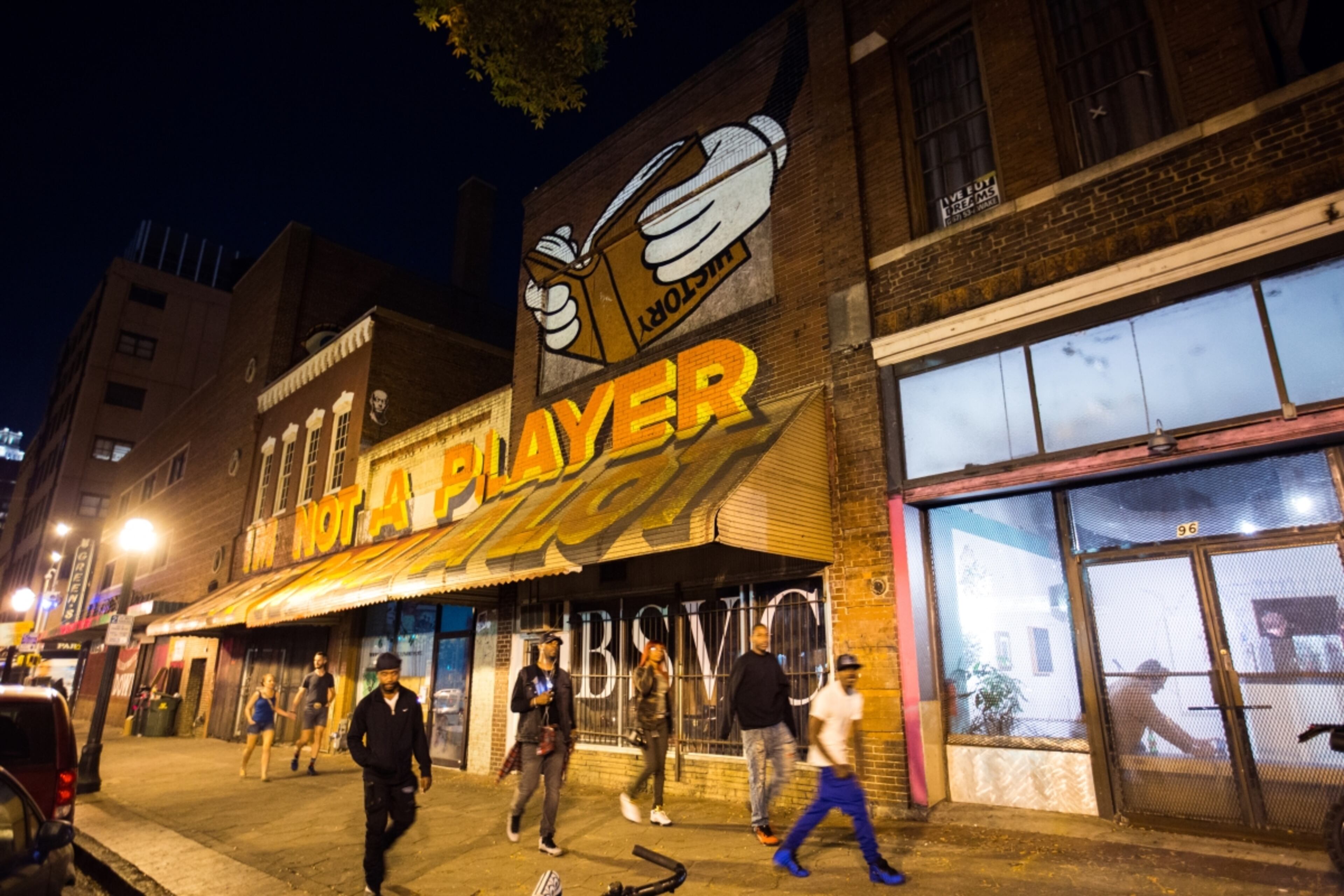 The Mammal Gallery exits onto Broad Street in southwest downtown Atlanta. The art and performance gallery hosts the un sound choreographed performance, a silent performance where audience is asked to arrive and stay silent. The performance ran about a month.