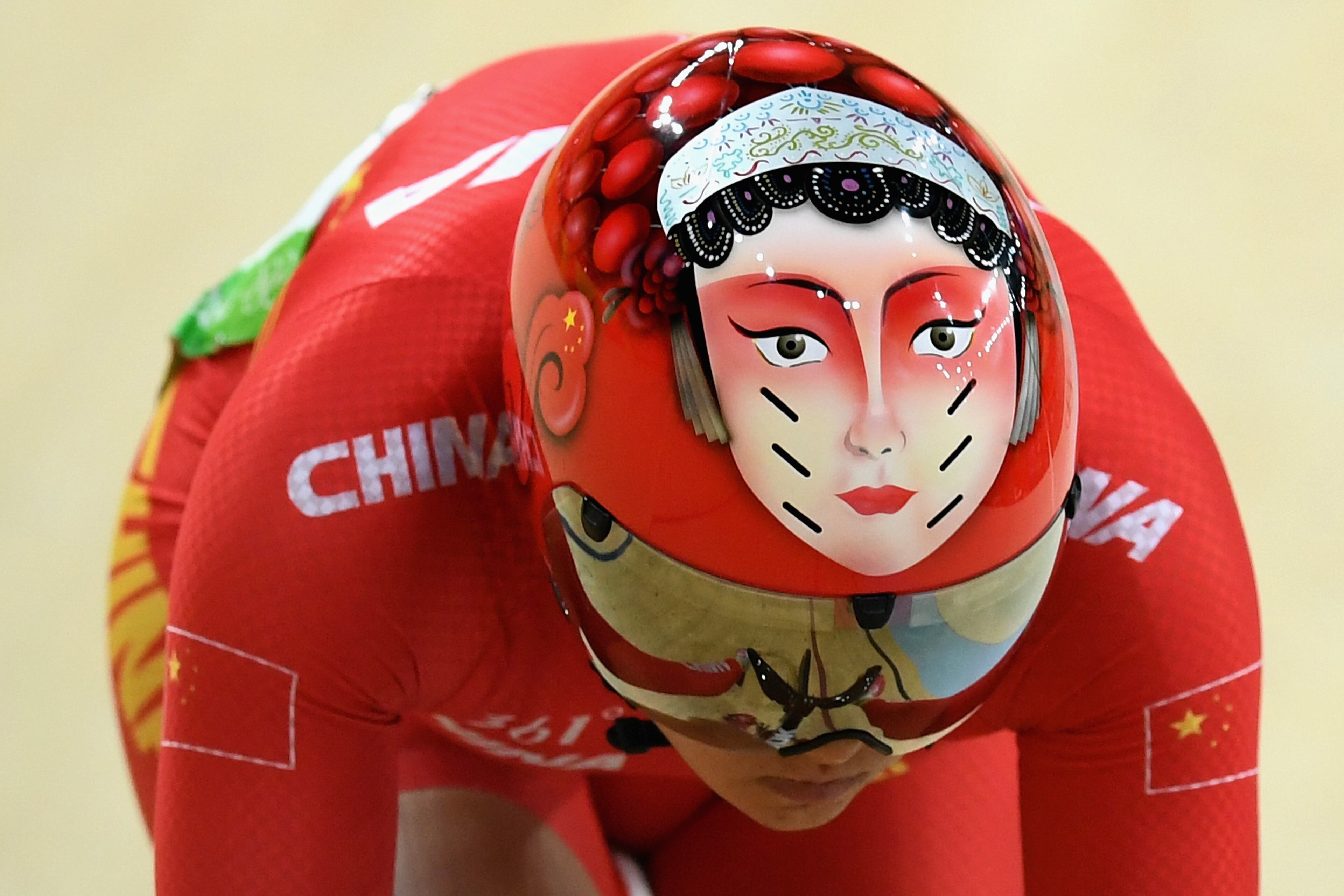 Tianshi Zhong of China competes against Anastasiia Voinova of Russia during the Cycling Track Women's Sprint 1/8 Finals on Day 10 of the Rio 2016 Olympic Games at the Rio Olympic Velodrome on August 15, 2016 in Rio de Janeiro, Brazil. (Photo by David Ramos/Getty Images)