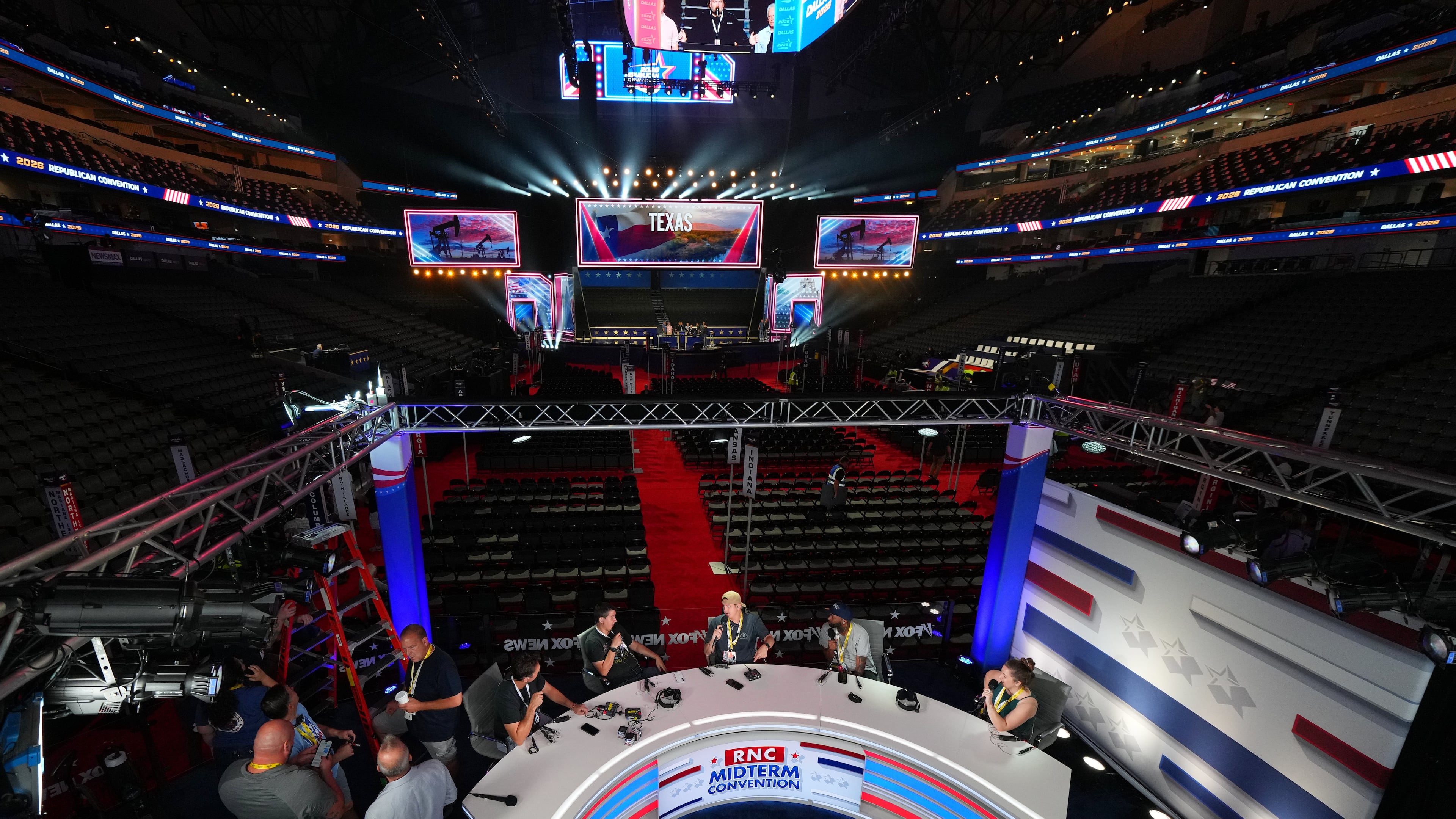 Production members test a stage on Tuesday ahead of the Republican in Dallas. (Julio Cortez/AP)