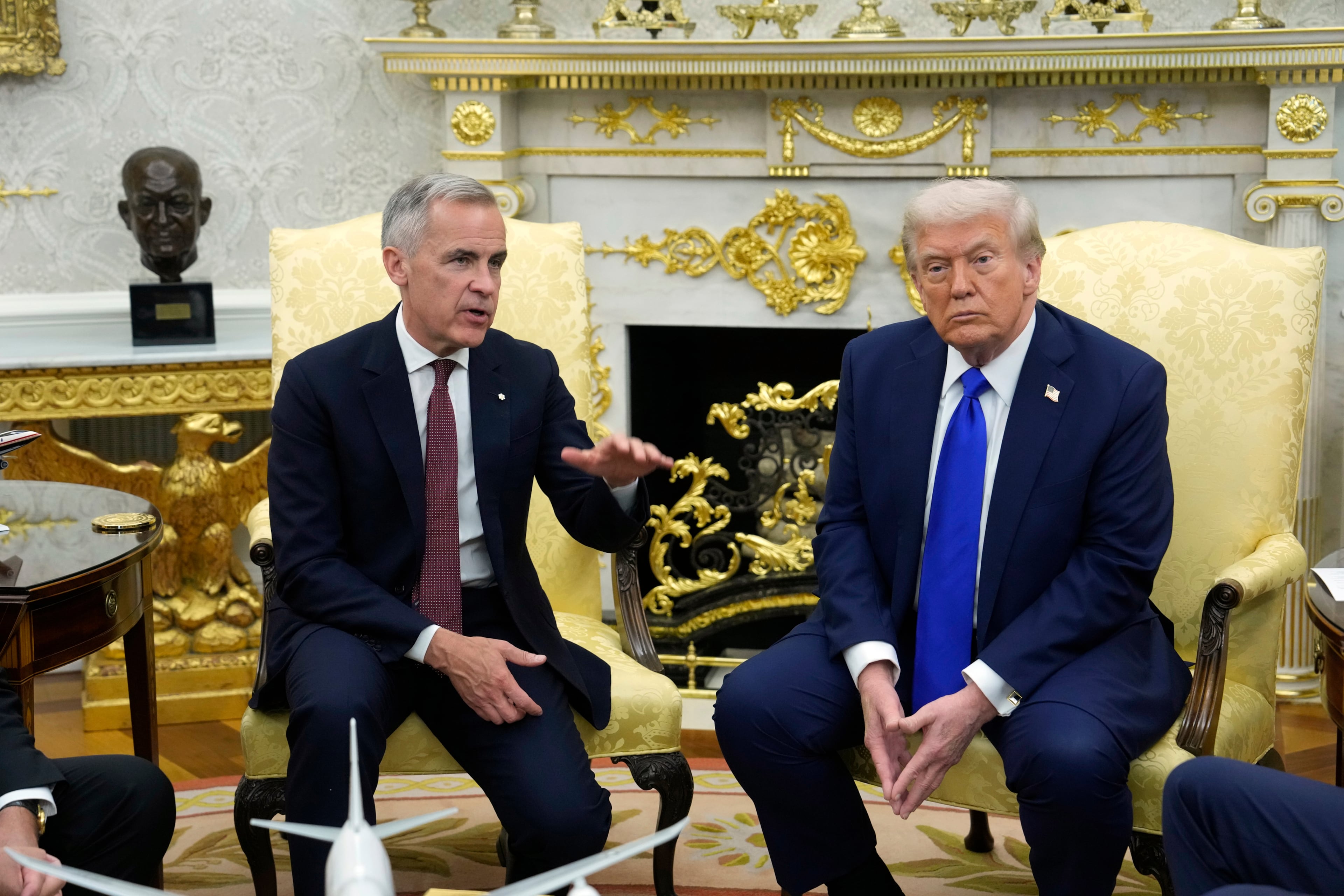 Canadian Prime Minister Mark Carney and U.S. President Donald Trump hold a press conference at the White House in Washington, D.C., Oct. 7, 2025. (Adrian Wyld/The Canadian Press via AP)