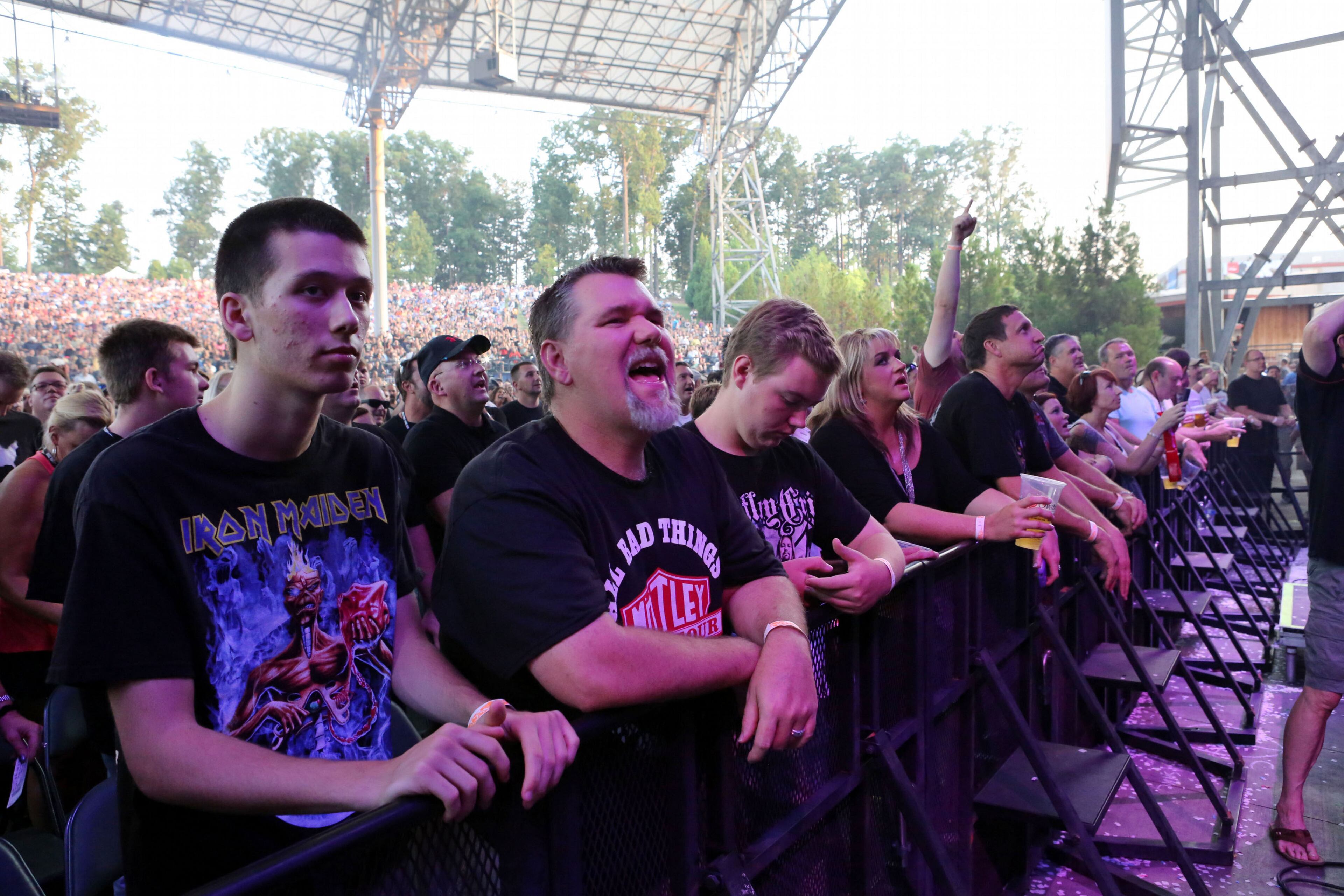 #24 of #24. PLEASE KEEP IN SEQUENTIAL ORDER FOR THE CONTINUITY OF THE GALLERY. - Front row fans rock out to Alice Cooper. Motley Crue and Alice Cooper rocked a sold out crowd Saturday night at Verizon Wireless Amphitheatre in Alpharetta on Motley Crue's Final Tour tour. Robb D. Cohen/RobbsPhotos.com
