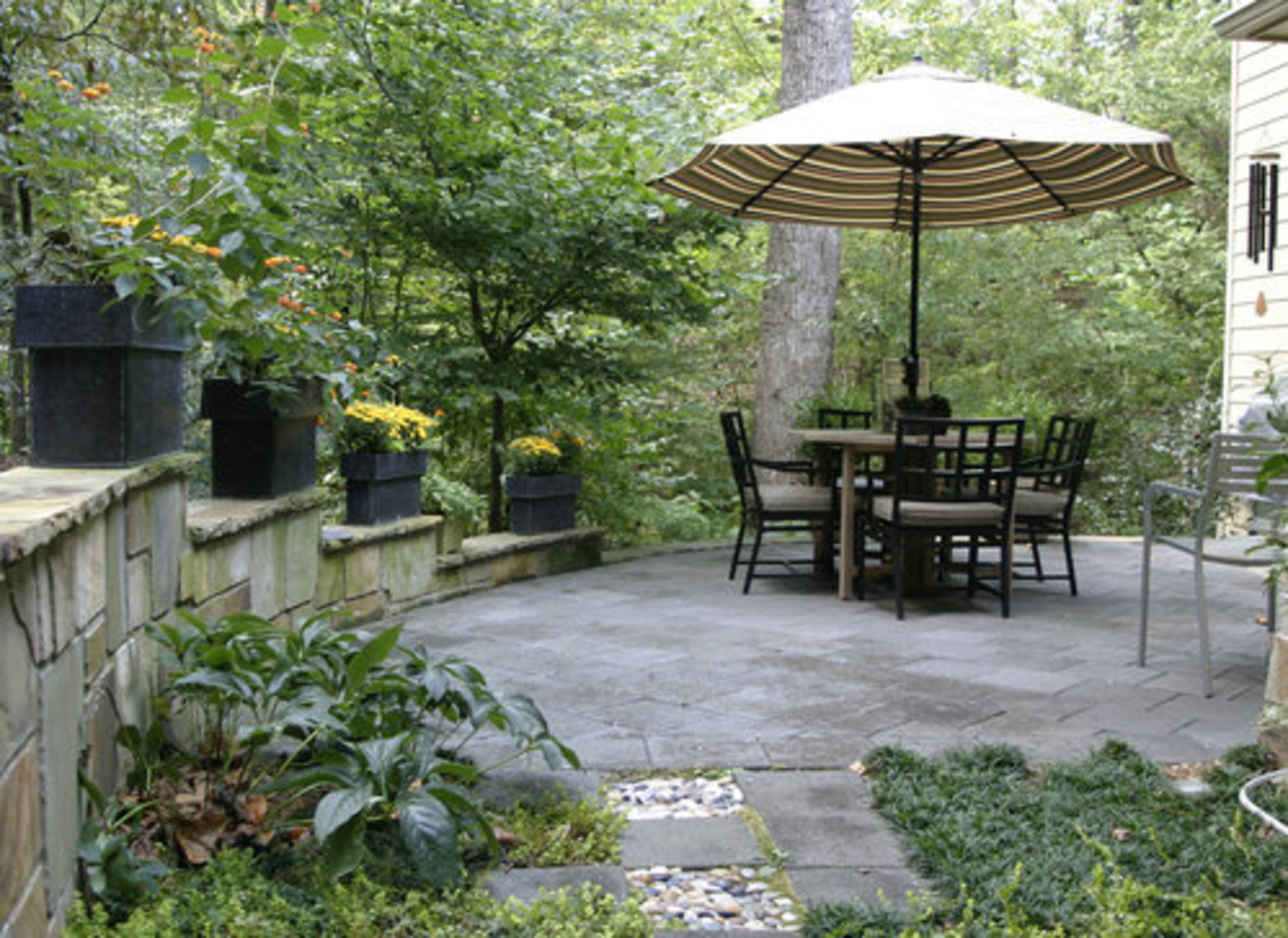 Greenmark Landscaping, owned by family friend Mark Erbesfield, did the hardscape around the home.