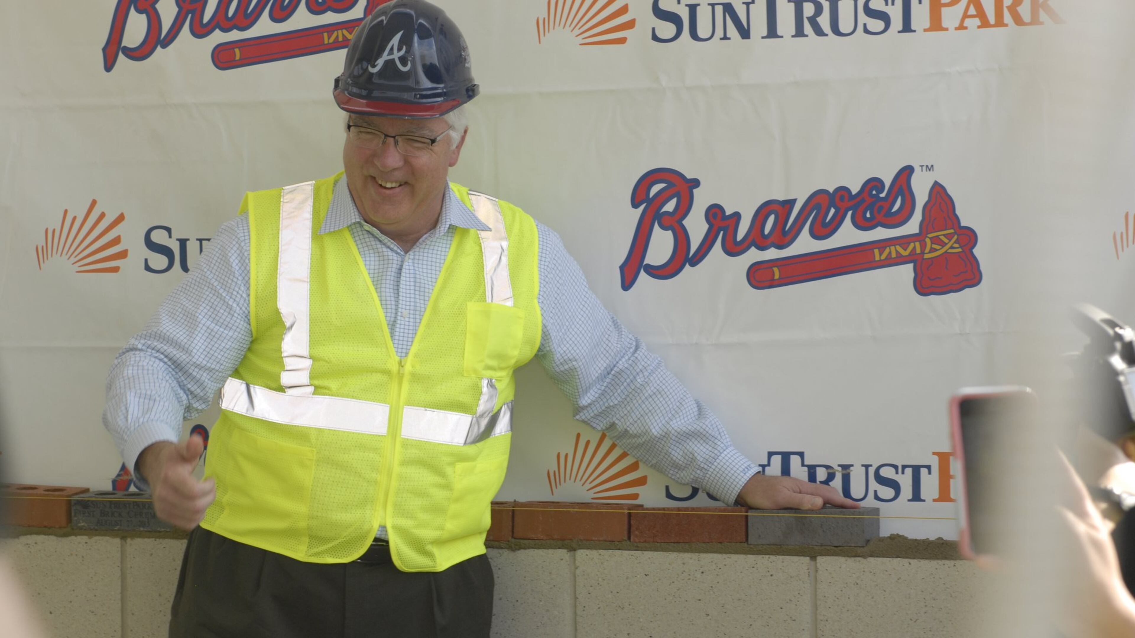 Cobb County Commission Chairman Tim Lee participates in the laying of ceremonial first bricks for SunTrust Park on Aug. 27, 2015. (Photo: J. Scott Trubey / Scott.Trubey@ajc.com)