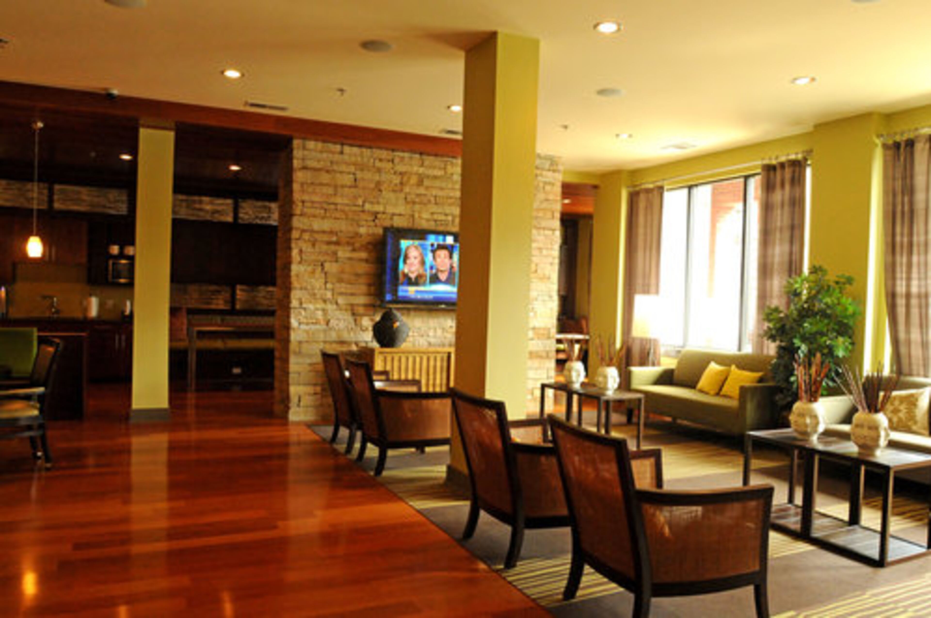 The elegant clubhouse is available for resident use and includes a variety of seating areas.