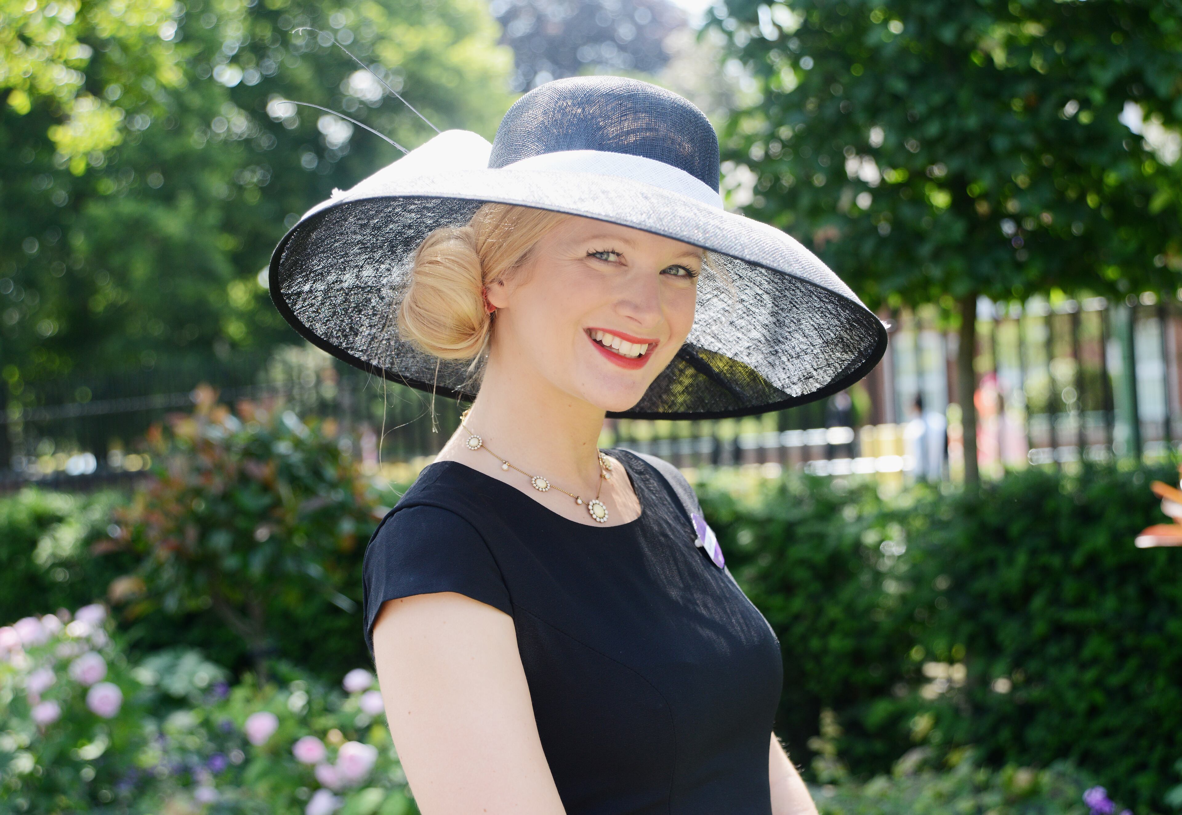 ASCOT, ENGLAND - JUNE 21: A racegoer attends day five of Royal Ascot at Ascot Racecourse on June 21, 2014 in Ascot, England. (Photo by Kirstin Sinclair/Getty Images for Ascot Racecourse)