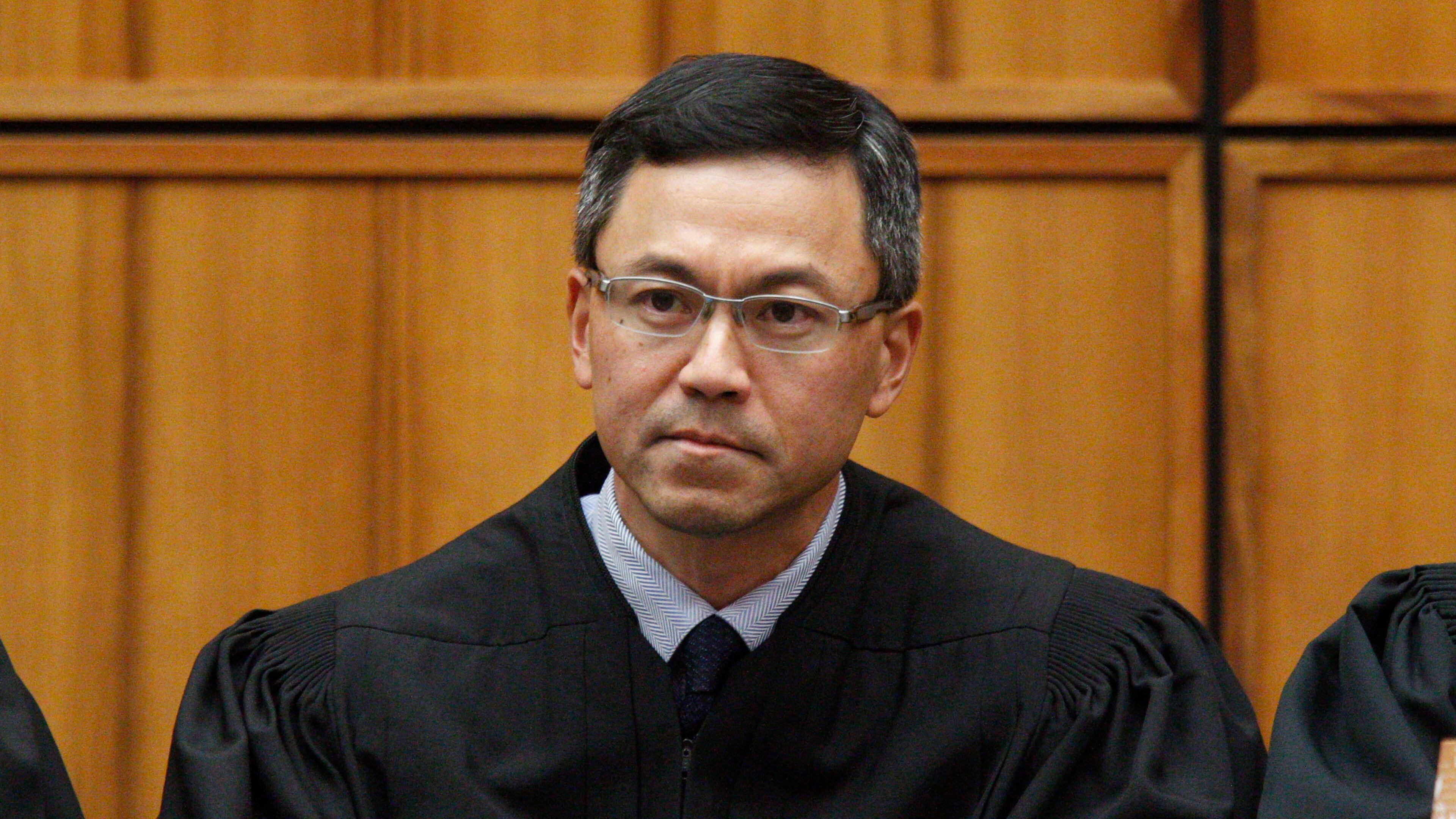 This December 2015 photo shows U.S. District Judge Derrick Watson in Honolulu. Hours before it was to take effect, President Donald Trump's revised travel ban was put on hold Wednesday, March 15, 2017, by Watson, a federal judge in Hawaii who questioned whether the administration was motivated by national security concerns. (George Lee/The Star-Advertiser via AP)