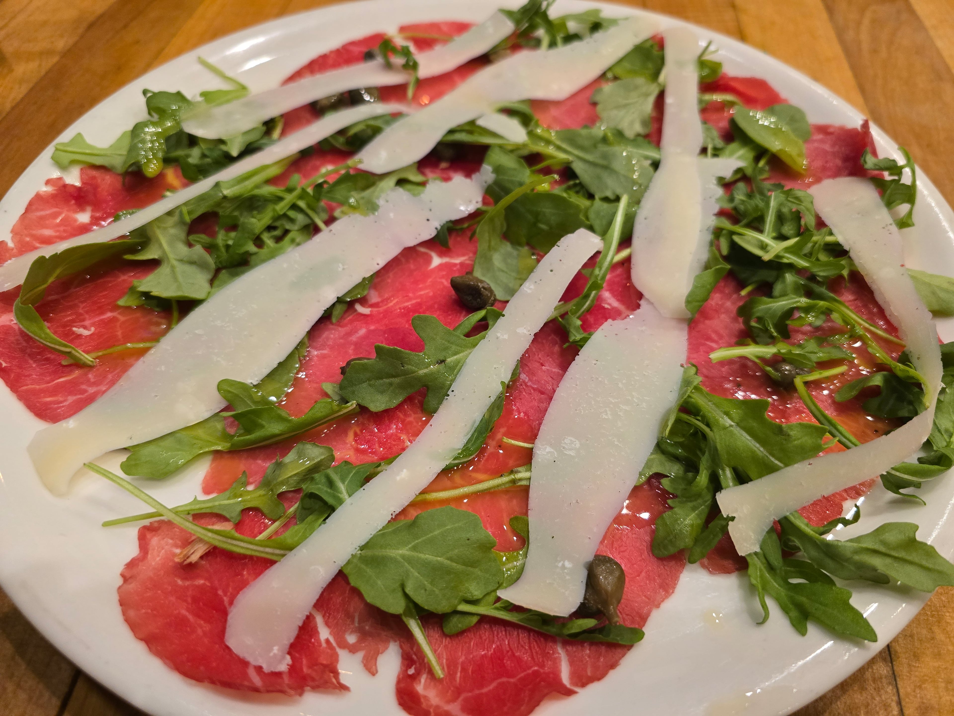 The beef carpaccio at Novo Cucina is textbook. There is nothing to criticize, yet it lacks spark. (Courtesy of Novo Cucina)