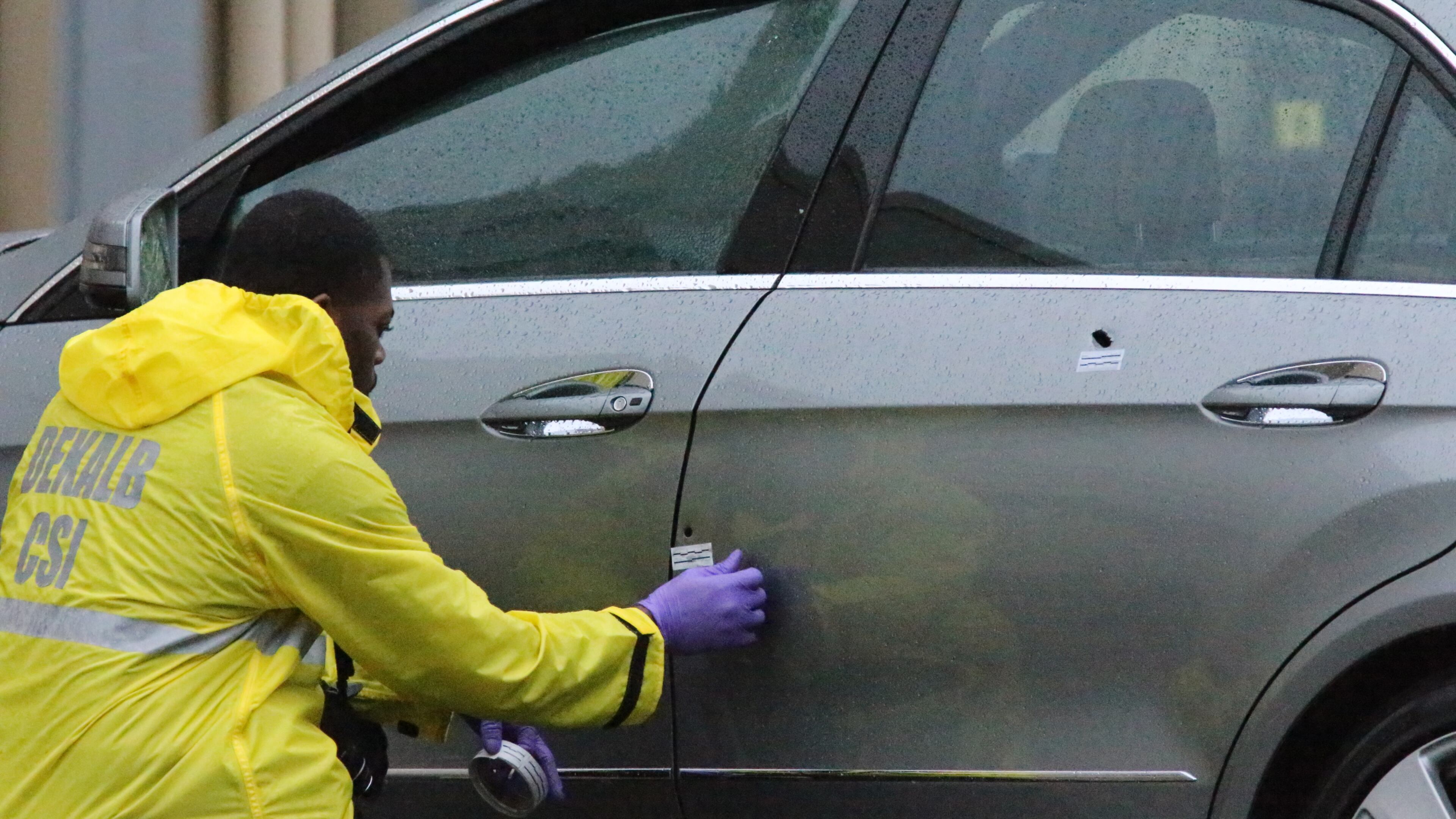 Police investigate an early morning shooting at the Velvet Room nightclub on Monday, March 3, 2014.