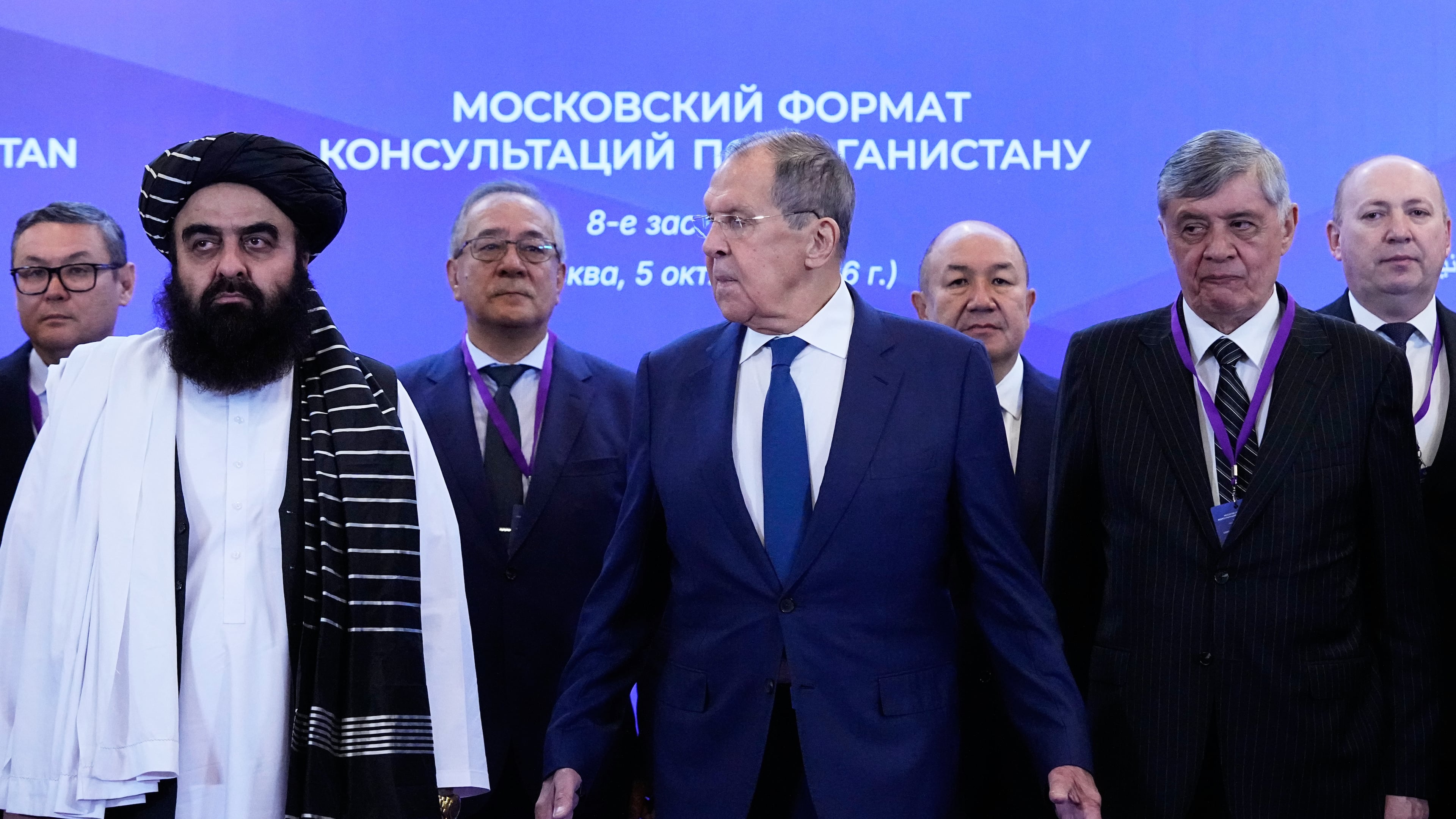 Front, from left, Afghanistan's Foreign Minister Amir Khan Muttaqi, Russian Foreign Minister Sergey Lavrov and Russian Presidential Envoy to Afghanistan Zamir Kabulov pose for a photo ahead of the Moscow format consultations on Afghanistan in Moscow, Monday, Oct. 5, 2026. (AP Photo/Alexander Zemlianichenko)