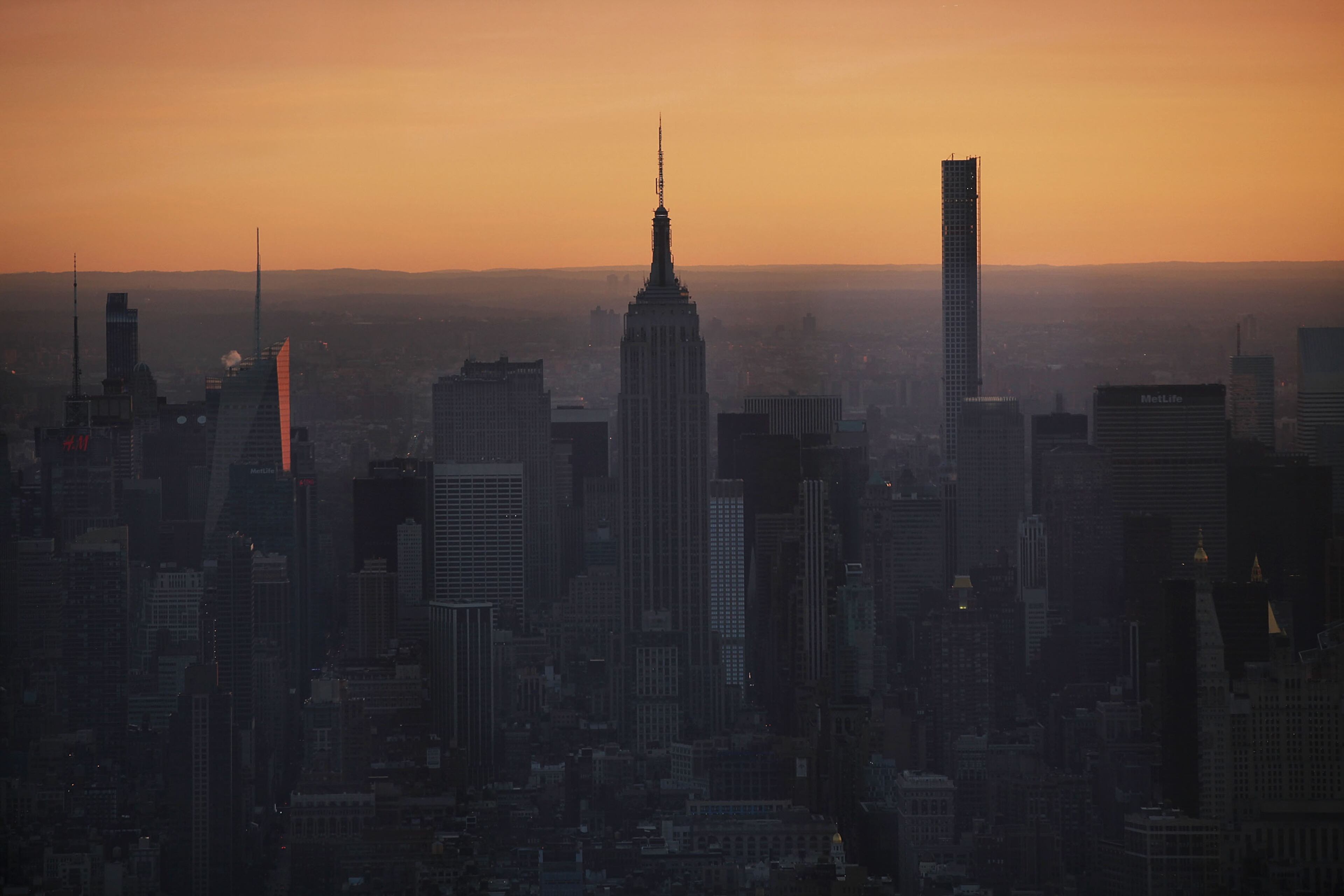 NEW YORK, NY - MAY 29: The empire state building and Manhattan buildings are viewed at dawn from the newly built One World Observatory at One World Trade Center on the day it opens to the public on May 29, 2015 in New York City. The observation deck sits atop the 104-story skyscraper at the former site of the Twin Towers and is expected to become one of Manhattan's top tourist attractions. (Photo by Spencer Platt/Getty Images)