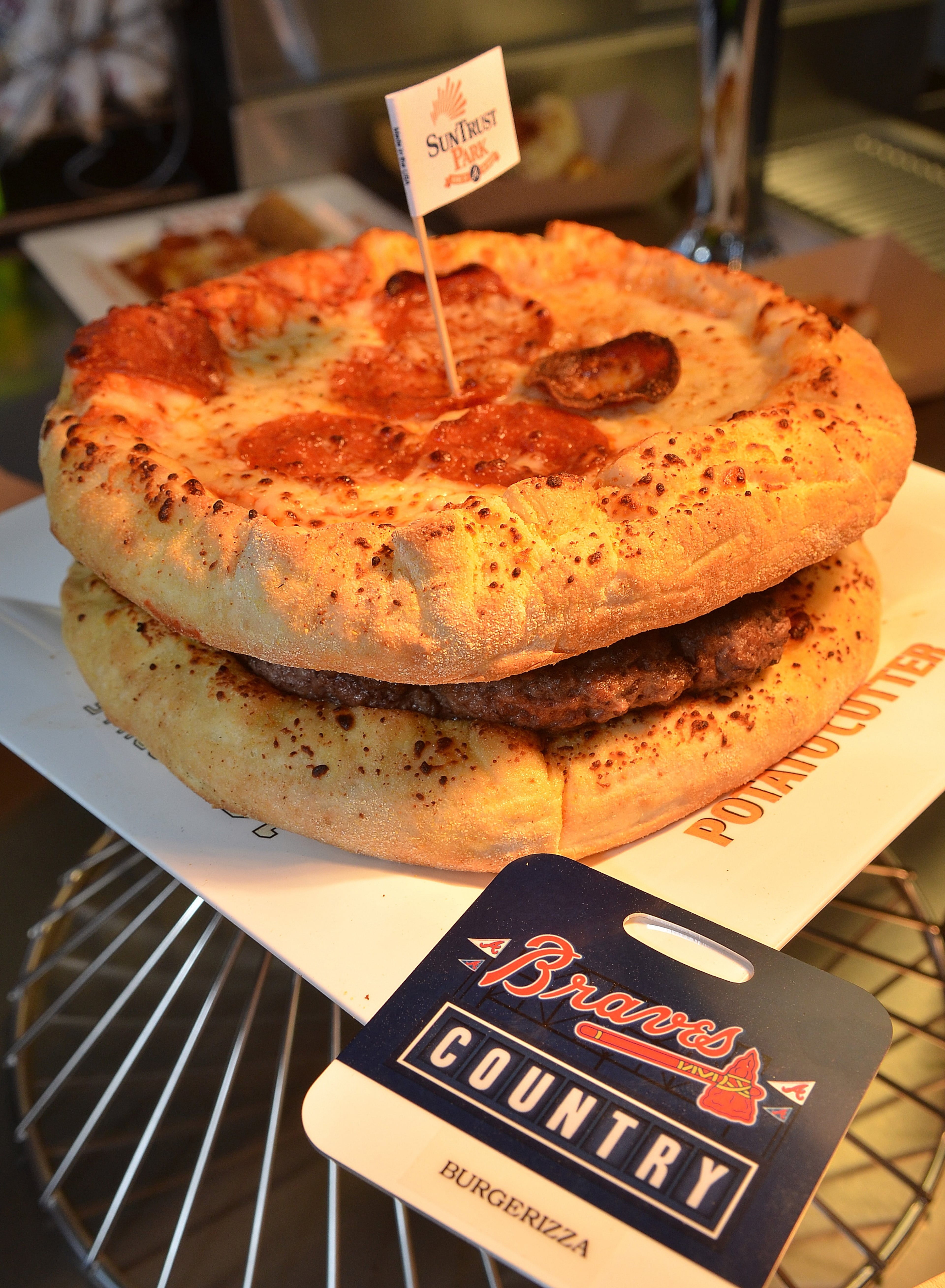 170323 Atlanta, Ga (Suntrust Park): The Burgerizza, from Slice will be one of the offerings for the 2017 Braves season at Suntrust Park. The Atlanta Braves and Delaware North Sportservice, the hospitality and food service provider for the Atlanta Braves, host a tasting tour of the soon to be opened Suntrust Park to reveal the food and beverage options available for the 2017 season. All photos taken Thursday March 23, 2017 at Suntrust Park 755 Battery Avenue, Smyrna, Ga 30339. (Chris Hunt/Special) for story slugged 041417Bravesdishes
