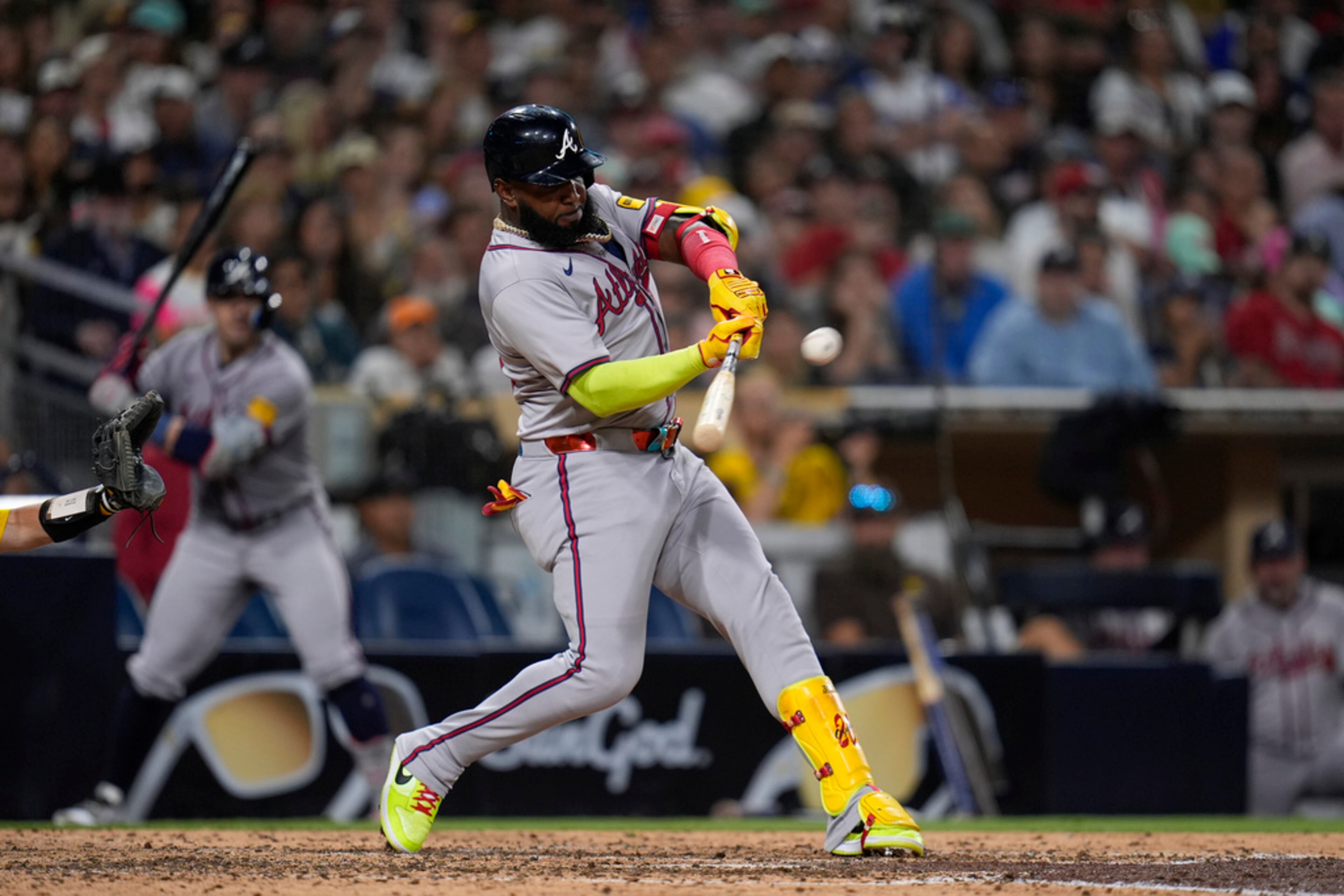 Atlanta Braves' Marcell Ozuna hits a home run during the ninth inning of a baseball game against the San Diego Padres, Friday, July 12, 2024, in San Diego. (AP Photo/Gregory Bull)