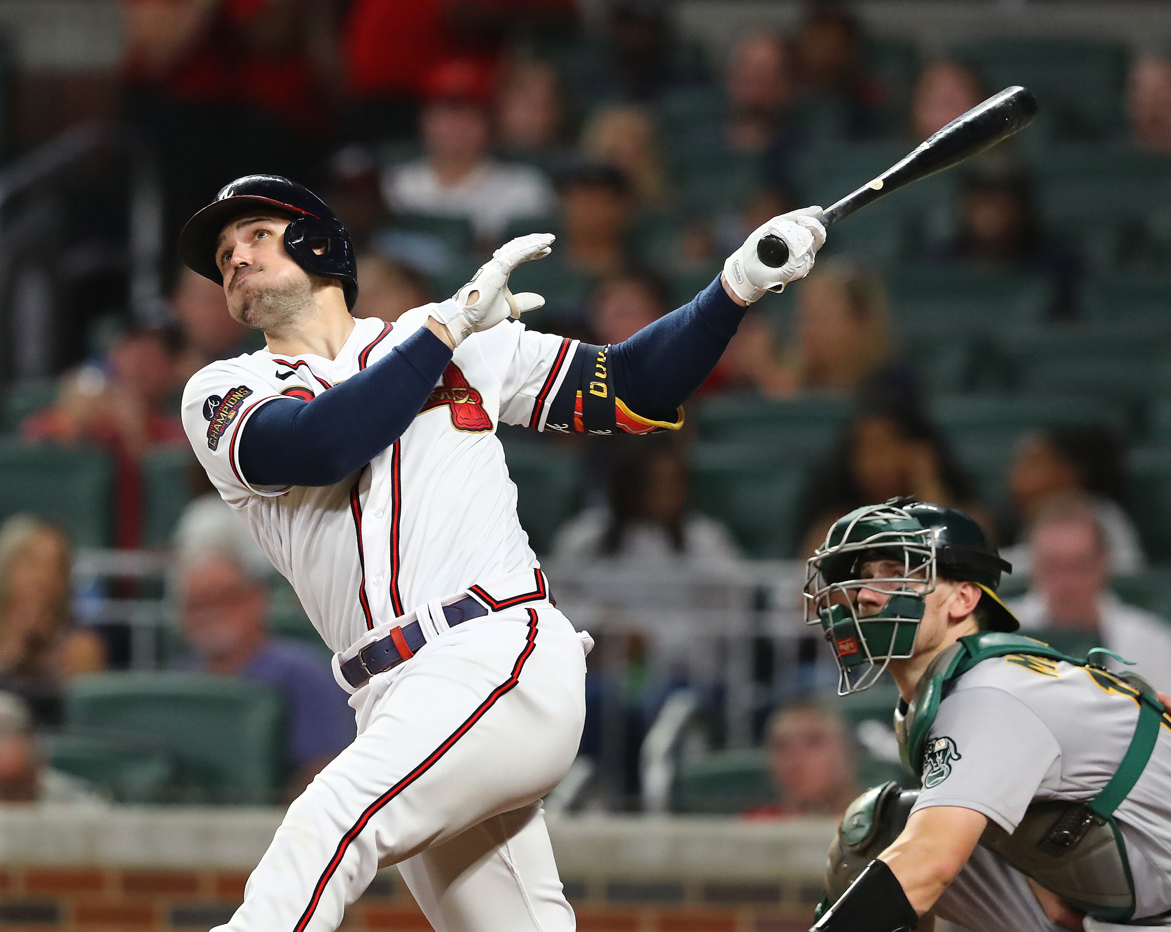 Atlanta Braves outfielder Adam Duvall hits a two-run homer to give his team a 13-2 lead over the Oakland Athletics during the seventh inning of an MLB game on Wednesday, June 8, 2022, in Atlanta. (Curtis Compton / Curtis.Compton@ajc.com)