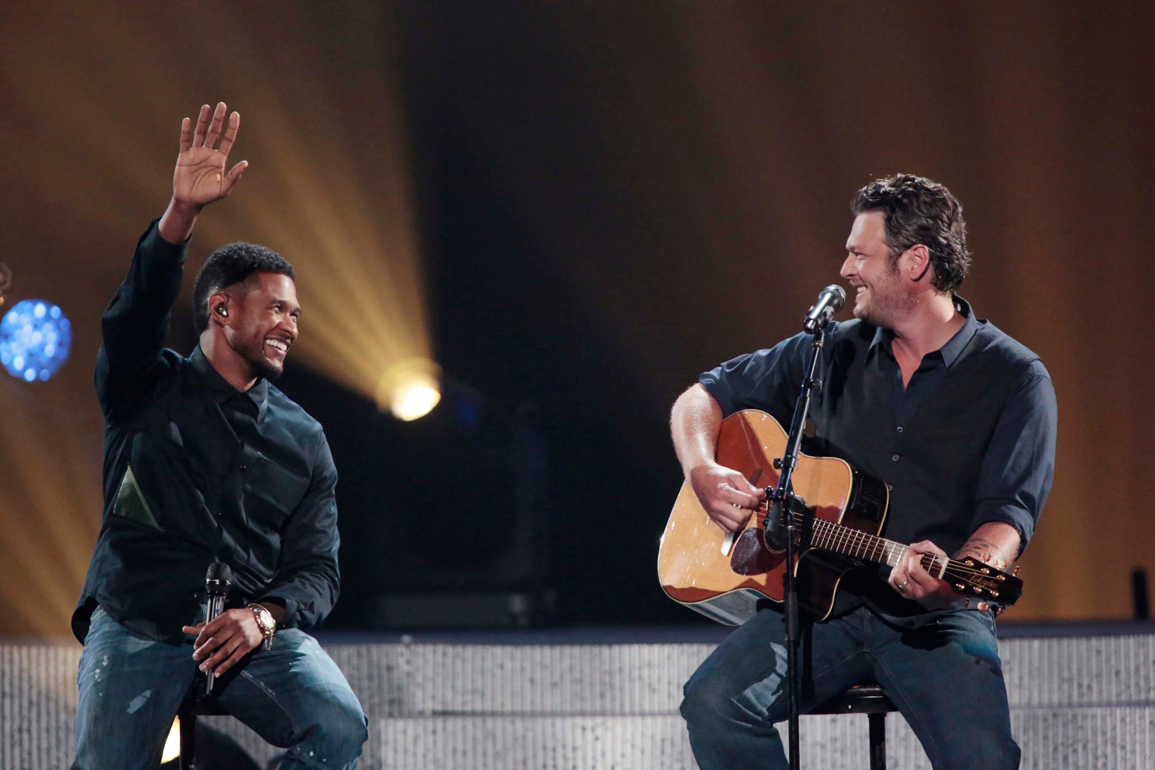 Blake Shelton, right, and Usher during the Healing in the Heartland: Relief Benefit Concert at the Chesapeake Energy Arena in Oklahoma City, Okla., Wednesday, May 29,2013. Funds raised by the benefit will go to the United Way of Central Oklahoma, for recovery efforts for those affected by the May 20 tornado. (AP Photo/NBC, Brett Deering)