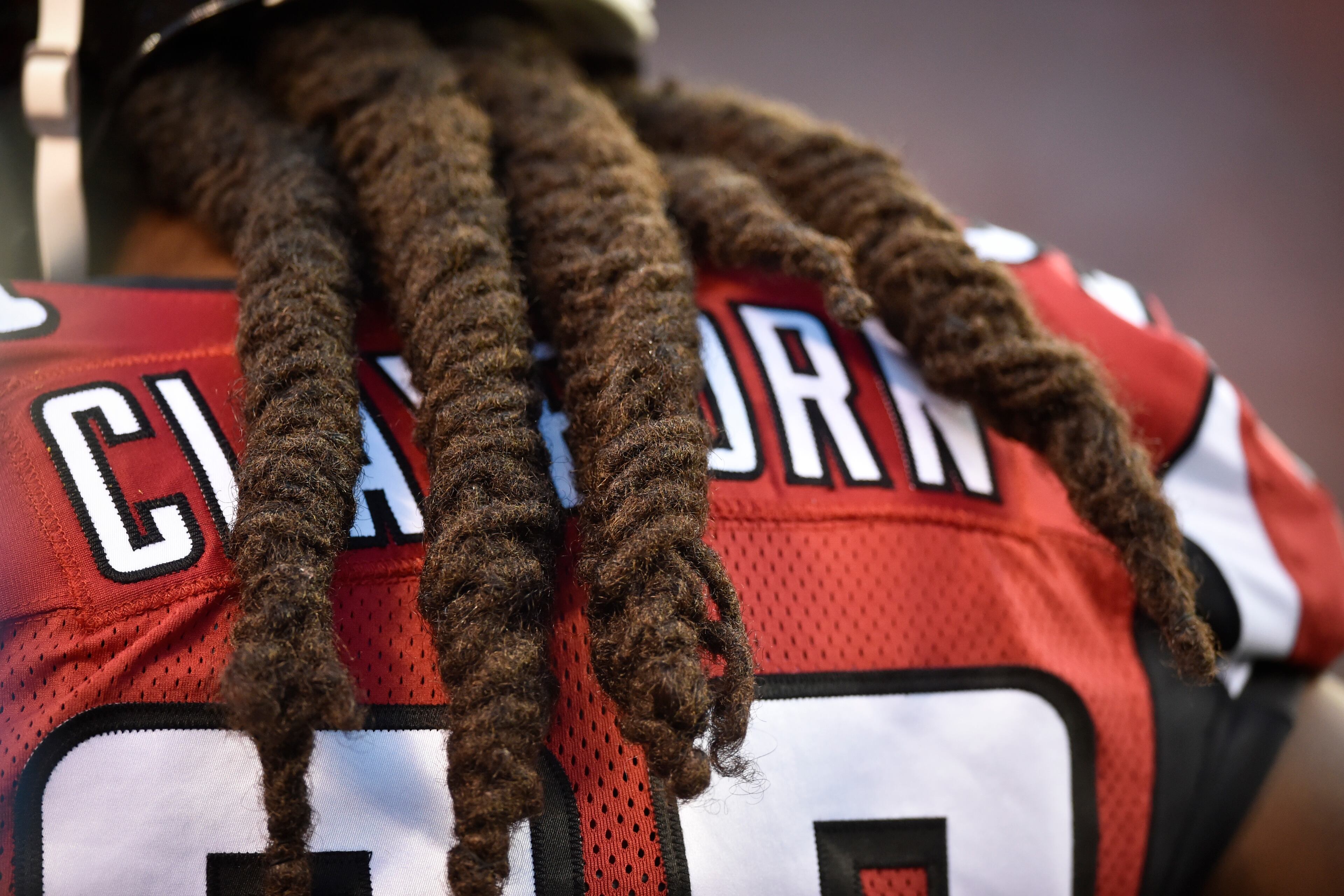Atlanta Falcons defensive end Adrian Clayborn walks the sidelines in the first half of an NFL preseason football game against the Cleveland Browns, Thursday, Aug. 18, 2016, in Cleveland. (AP Photo/David Richard)