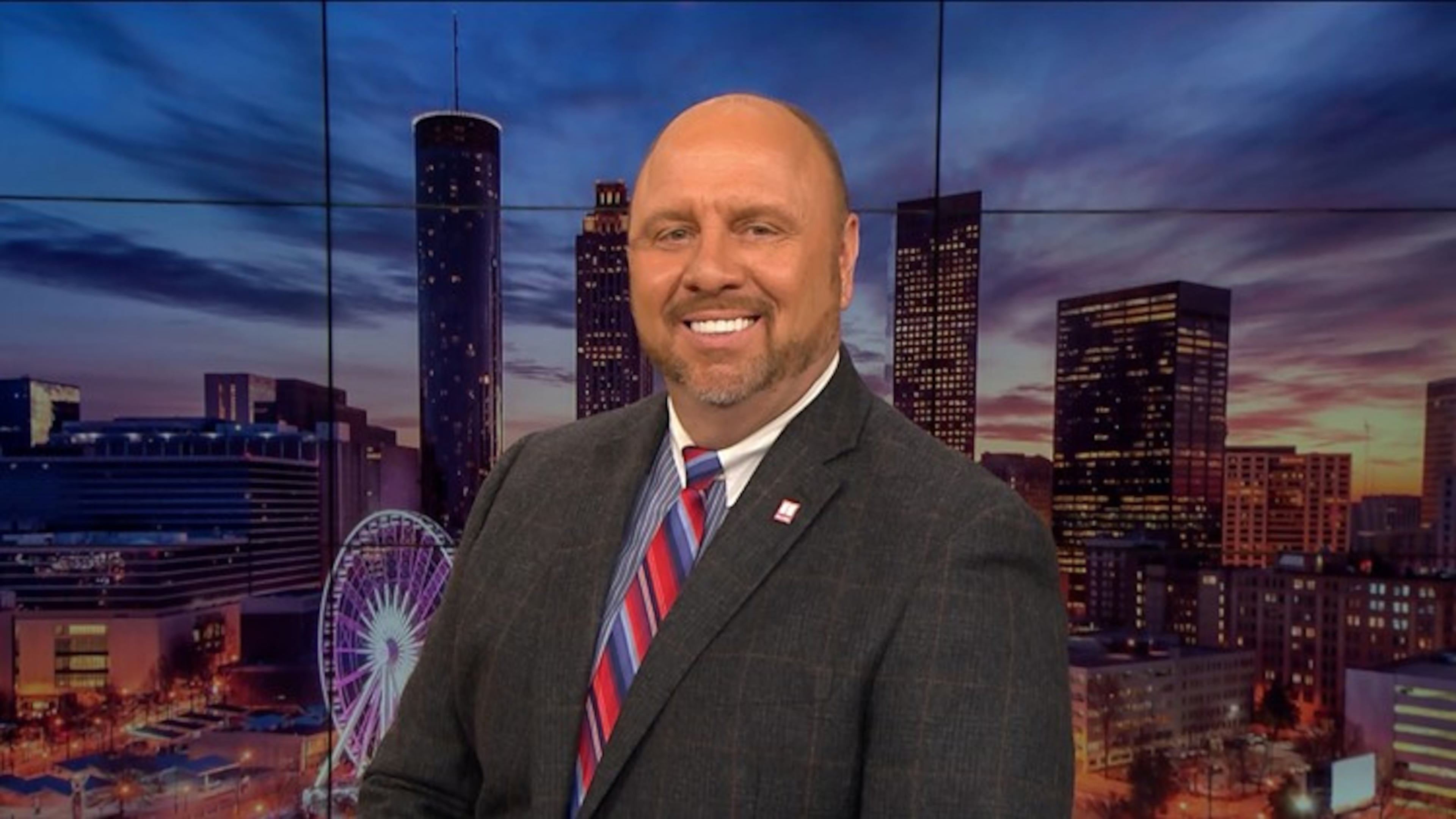 Crash Clark, shown in a 2022 promo photo during his stint with 11Alive, will begin covering traffic at WSB radio next week. (Courtesy of 11Alive)