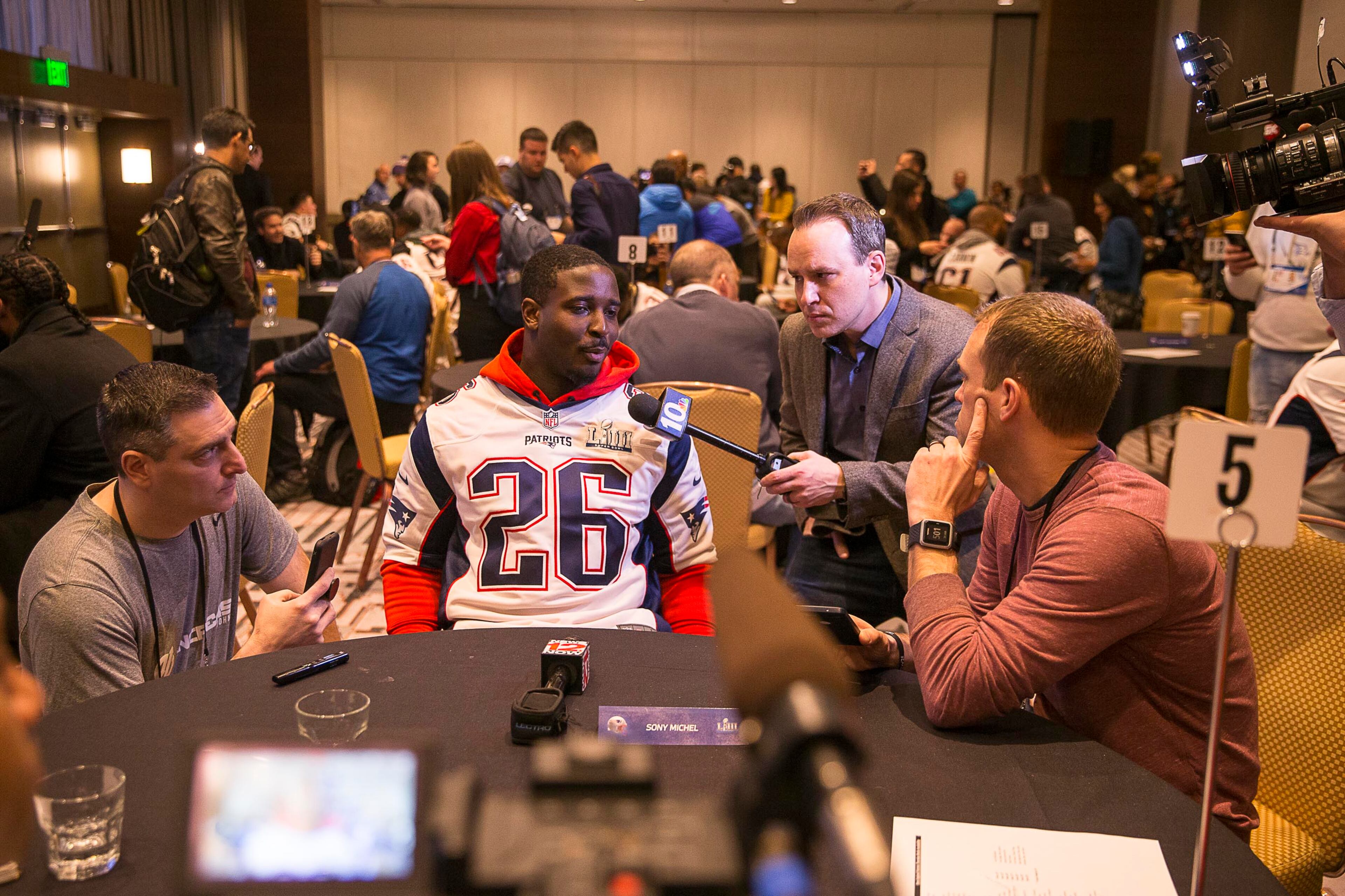 New England Patriots running back Sony Michel (26), who is a former Georgia Bulldog, speaks during the New England Patriots last media press conference before Super Bowl LIII at the Hyatt Regency in downtown Atlanta, Thursday, January 31, 2019. The Los Angles Rams will be playing the New England Patriots during the big game at Mercedes-Benz Stadium in Atlanta. (ALYSSA POINTER/ALYSSA.POINTER@AJC.COM)