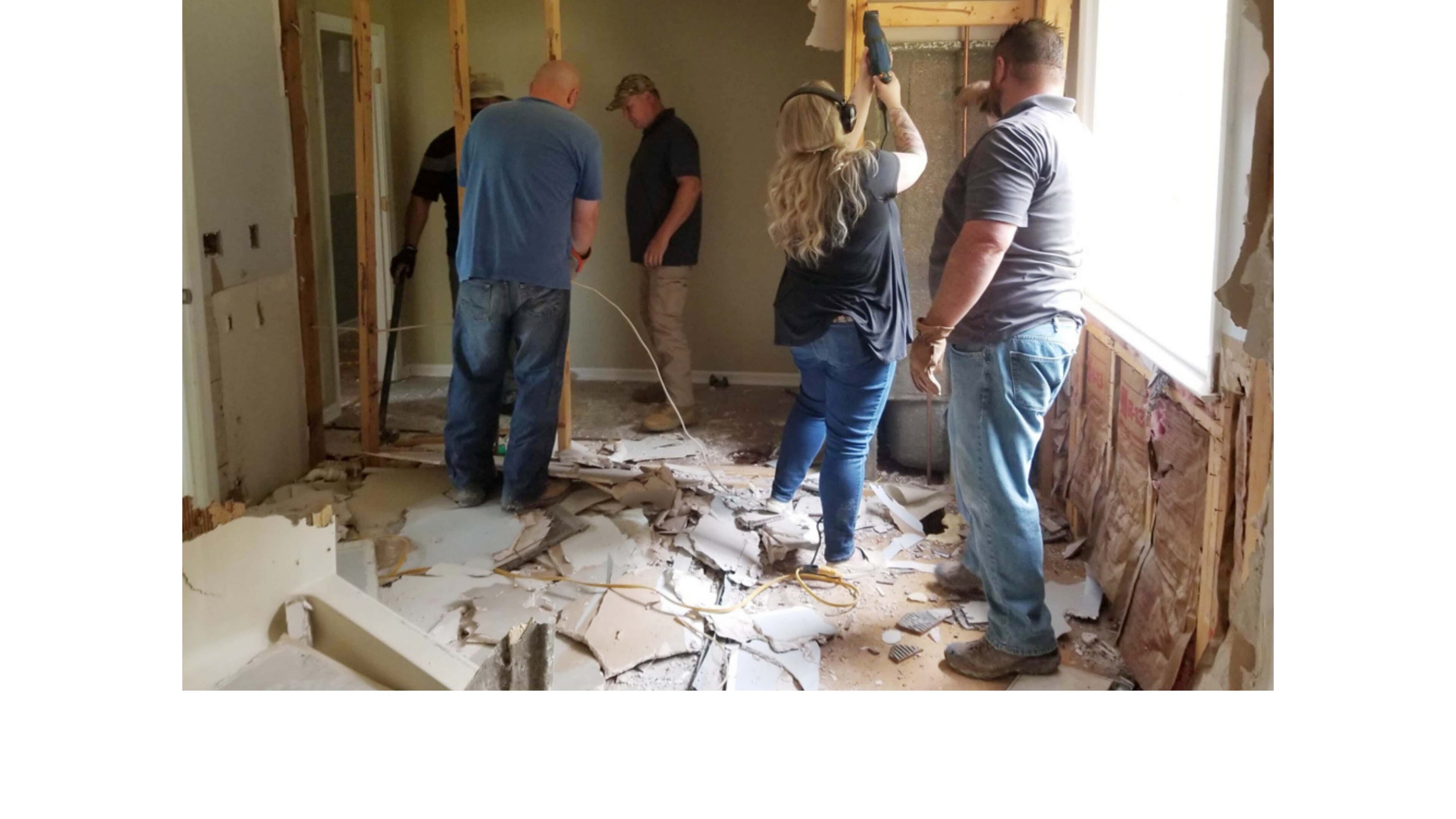 Employees from Century Complete builders demolished the interior of Angel House, a space for teens transitioning out of foster care or in need of emergency housing.