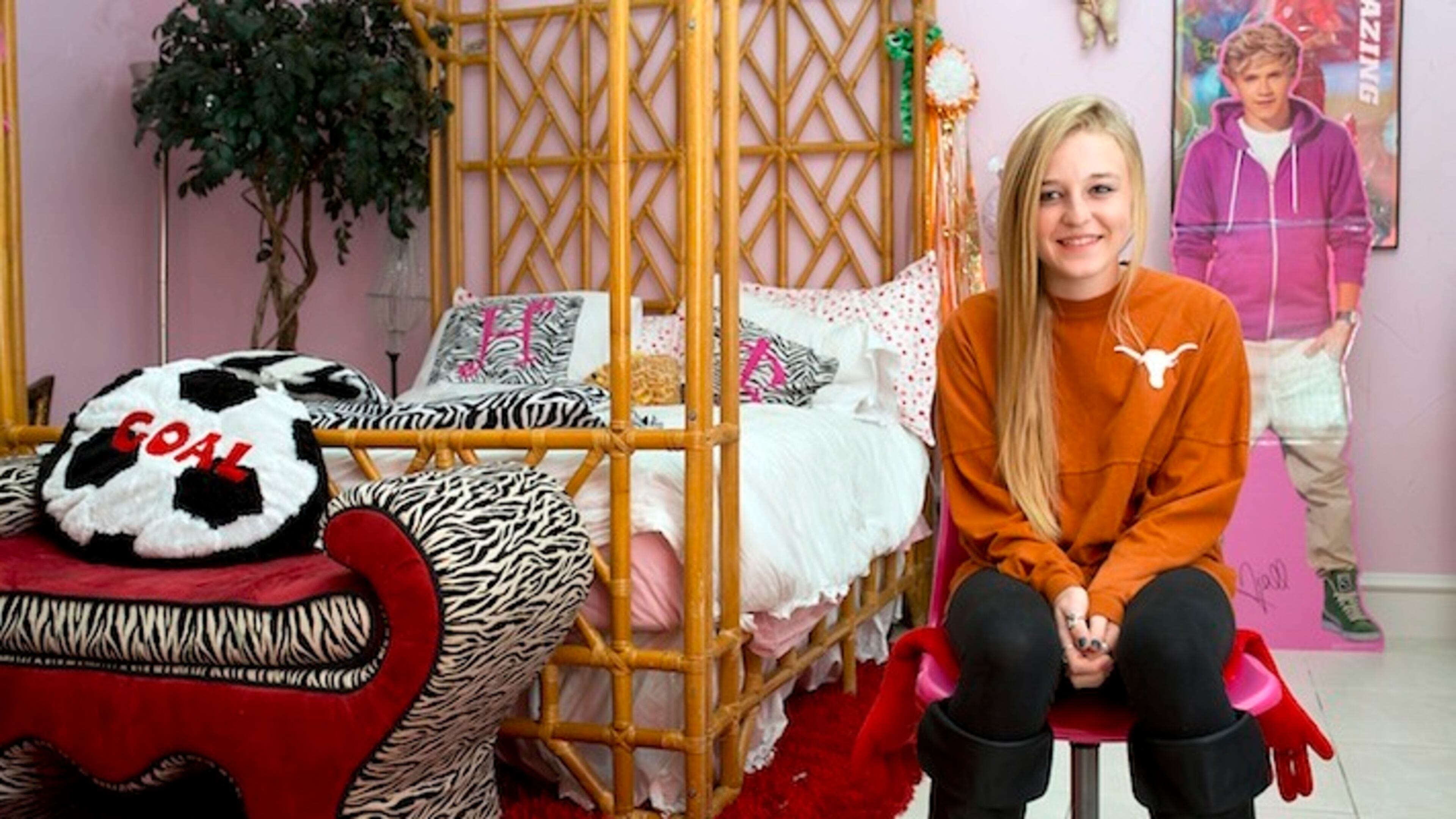 FILE -- Celina High School freshman Haley Berg, 15, who has already committed to play soccer for the University of Texas, in her bedroom in Celina, Texas, Jan. 23, 2014. College coaches are pushing the NCAA to end a largely hidden practice that has become increasingly common: the recruitment of young high school and occasionally even middle school students. (Cooper Neill/The New York Times)