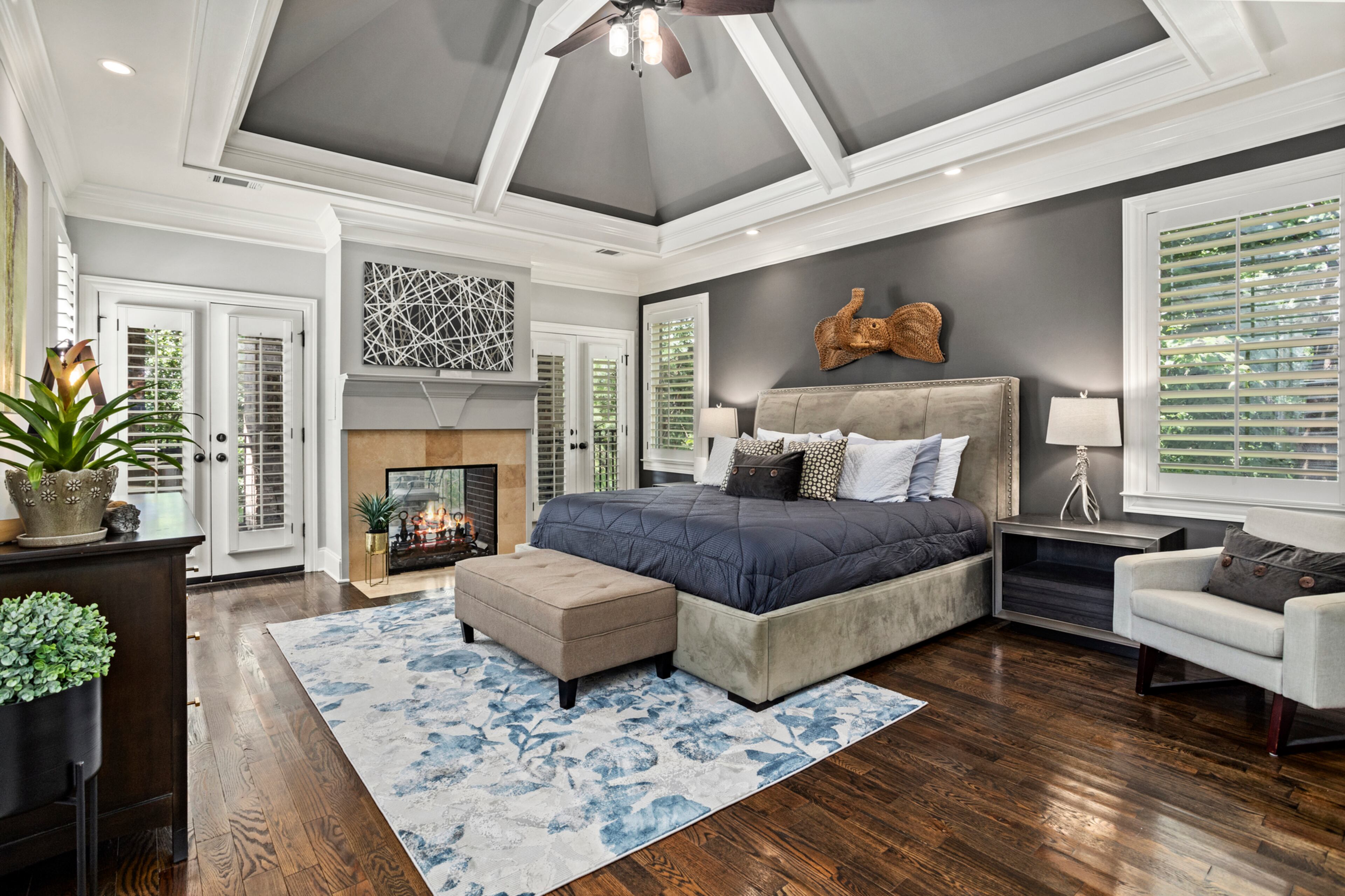 The master bedroom with glass fireplace. Text by Justin Longenbach