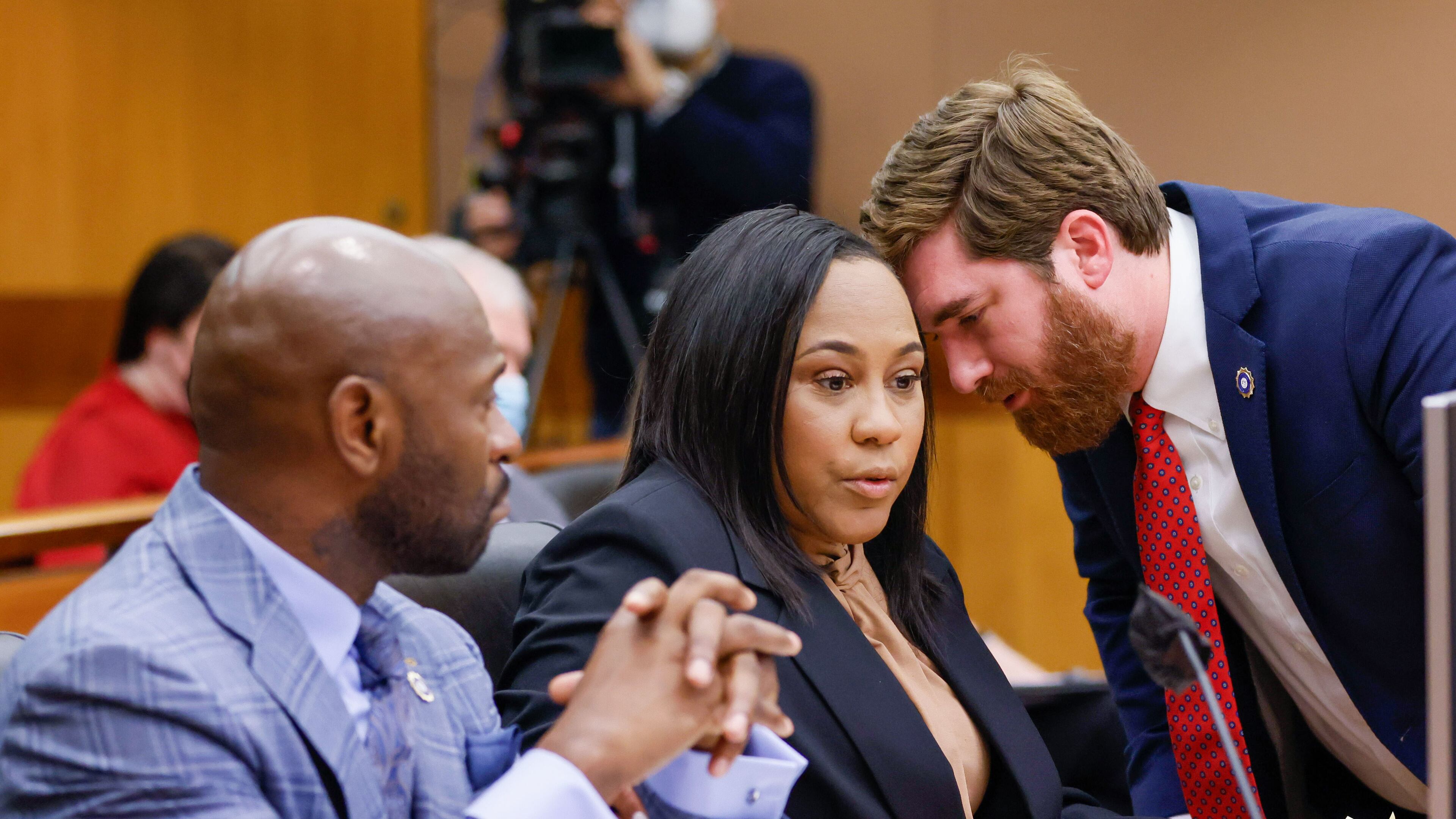 "Whistleblowers" inside the office of Fulton County District Attorney Fani Willis, center, want to talk to a Georgia Senate panel, said its chair, Sen. Bill Cowsert. While Cowsert says he has not talked to the whistleblowers, he said they want to discuss complaints they've raised involving “allegations about the misuse of both federal funds and state funds.” Miguel Martinez/miguel.martinezjimenez@ajc.com