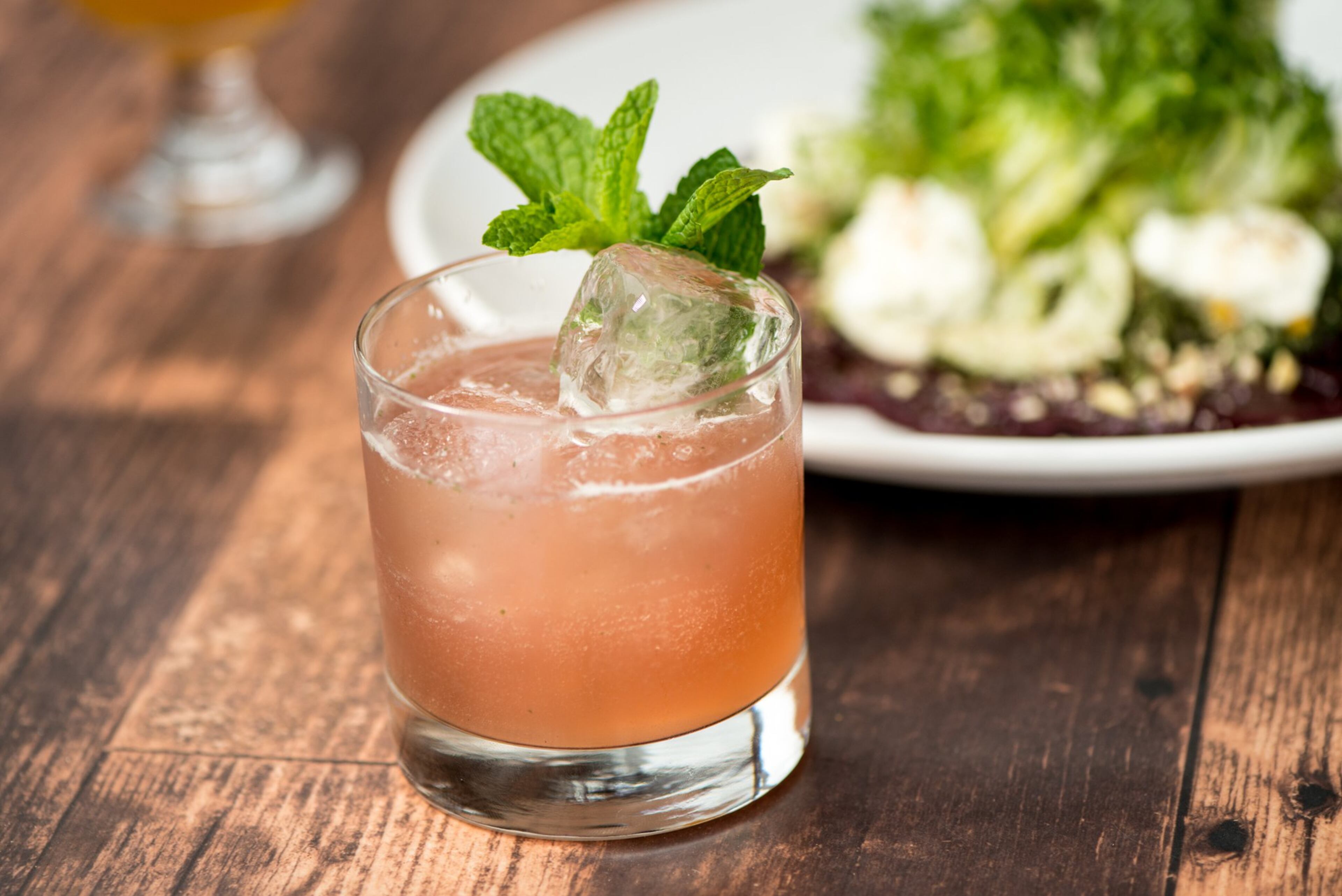 Mother's Ruin cocktail with Drumshanbo Gin, Bruto Americano, Grapefruit, Absinthe, Lemon, Mint. Photo credit- Mia Yakel.