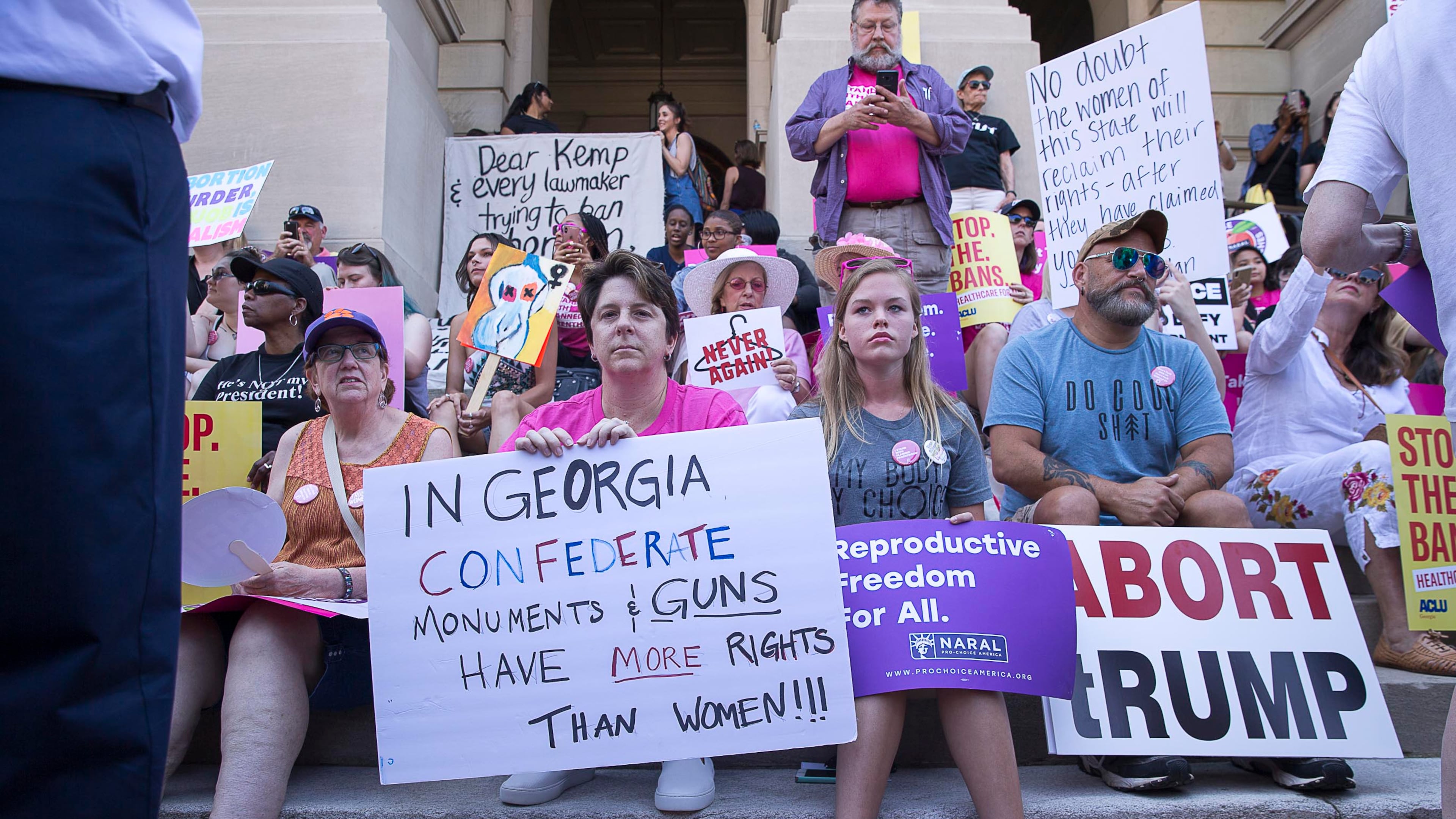 Abortion rights supporters gather on the steps of the state Capitol during a rally in May 2019. (Alyssa Pointer/AJC)