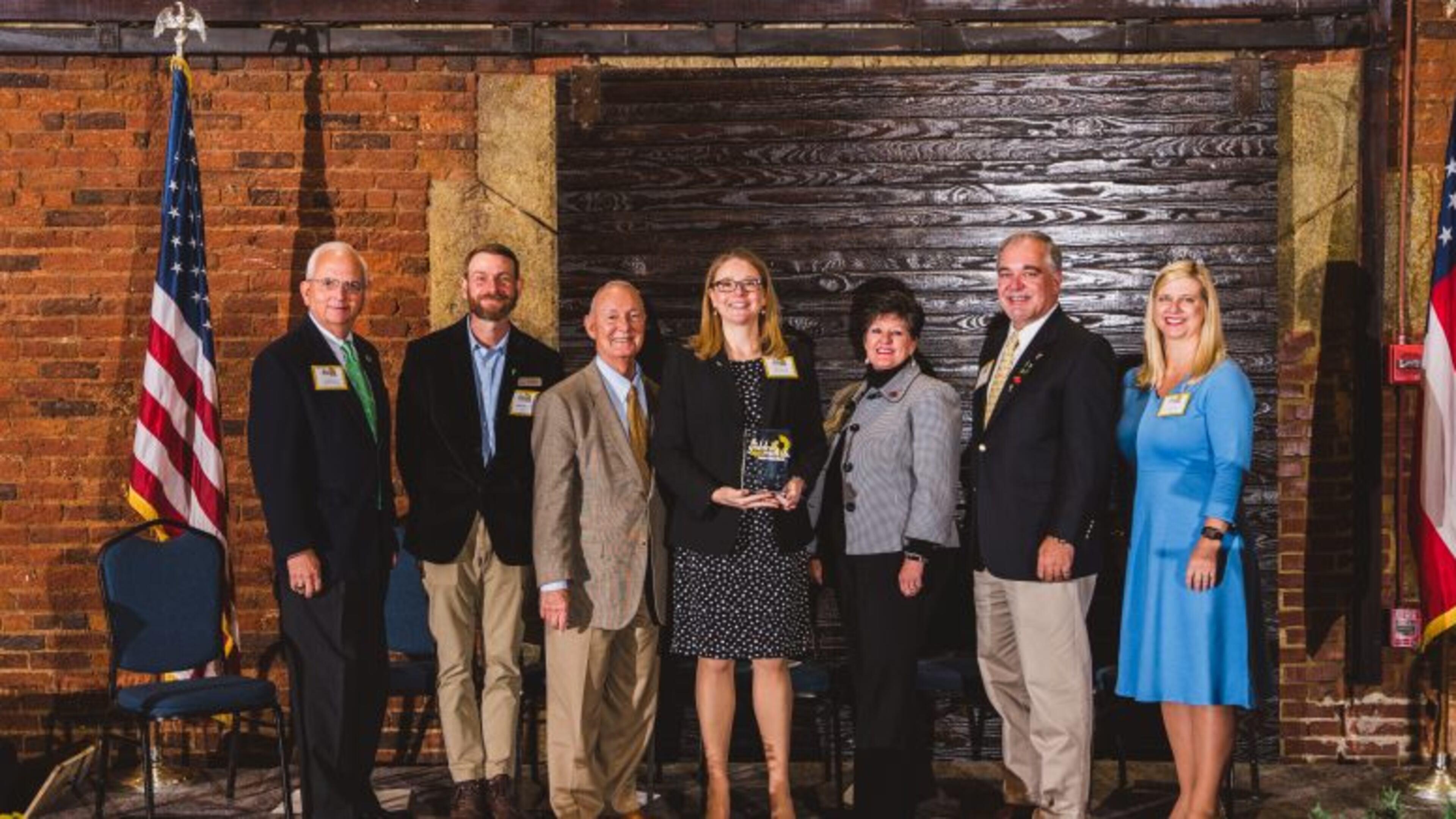 Among those at the Golden Radish Awards ceremony were (l-r) Georgia Commissioner of Agriculture Gary W. Black; Joseph Reynolds of Georgia Organics; Dr. J. Patrick O’Neal, Commissioner, Georgia Department of Public Health; Emily Halin, executive director of the Cobb County School District Food and Nutrition Services Department; Dr. Laura Perry Johnson, Associate Dean for UGA Extension; Georgia School Superintendent Richard Woods and Amy Jacobs, Commissioner, Georgia Department of Early Care and Learning. Courtesy of Cobb County School District