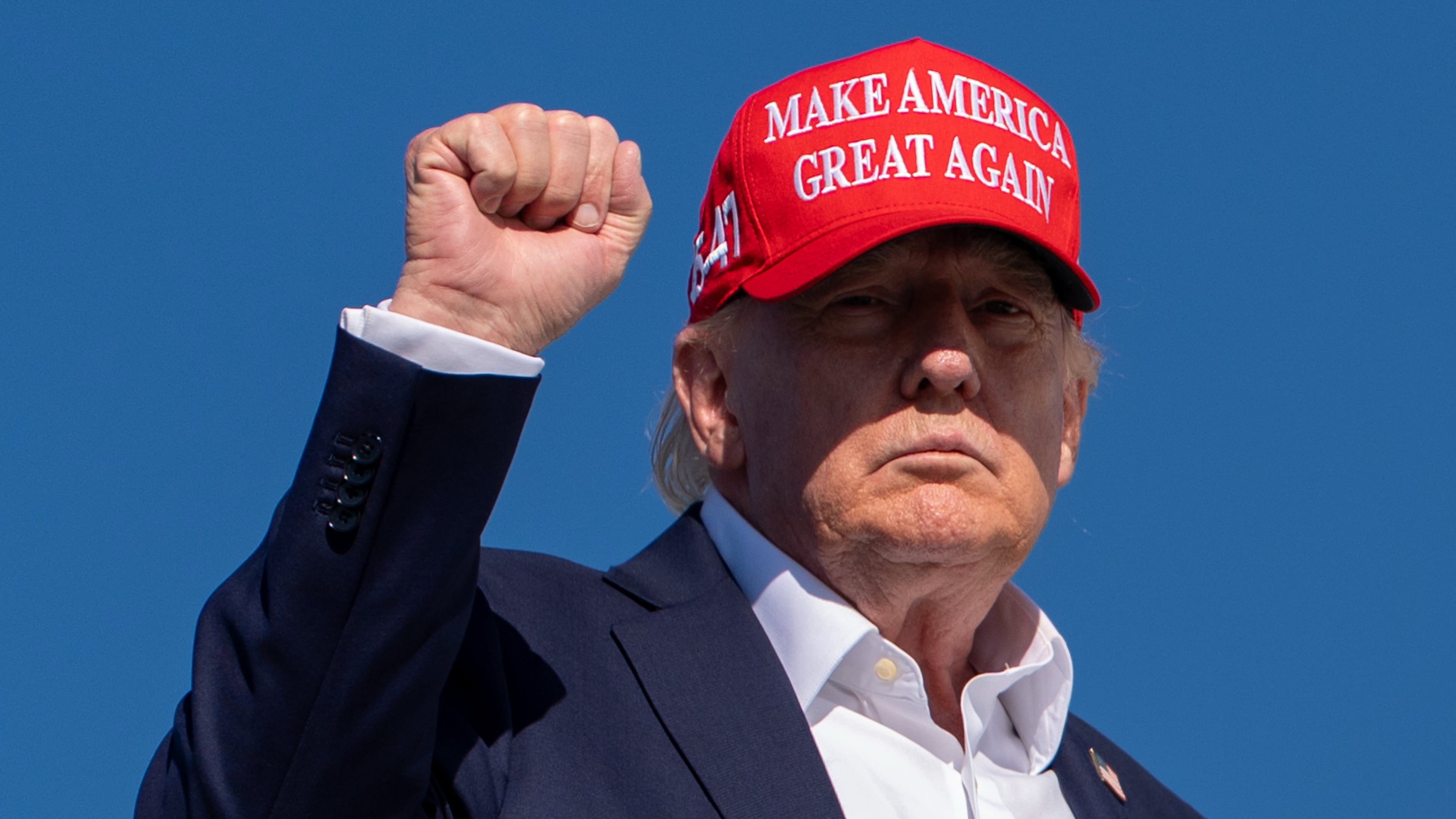 President Donald Trump gestures while boarding Air Force One at Morristown Airport, Monday, Sept. 7, 2026, in Morristown, N.J. (AP Photo/Julia Demaree Nikhinson)