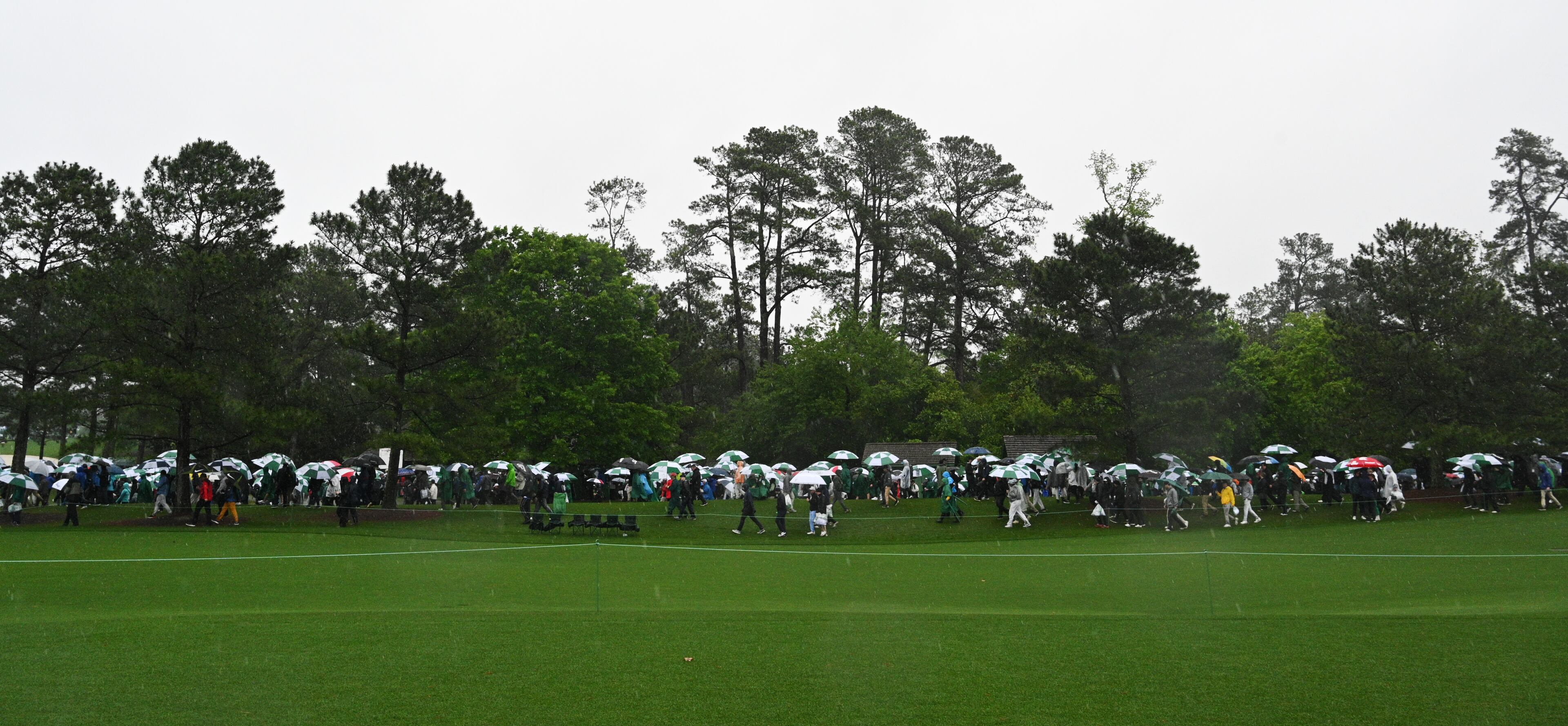 Patrons leave course during third round of the 2023 Masters Tournament at Augusta National Golf Club, Saturday, April 8, 2023, in Augusta, Ga. (Hyosub Shin / Hyosub.Shin@ajc.com)