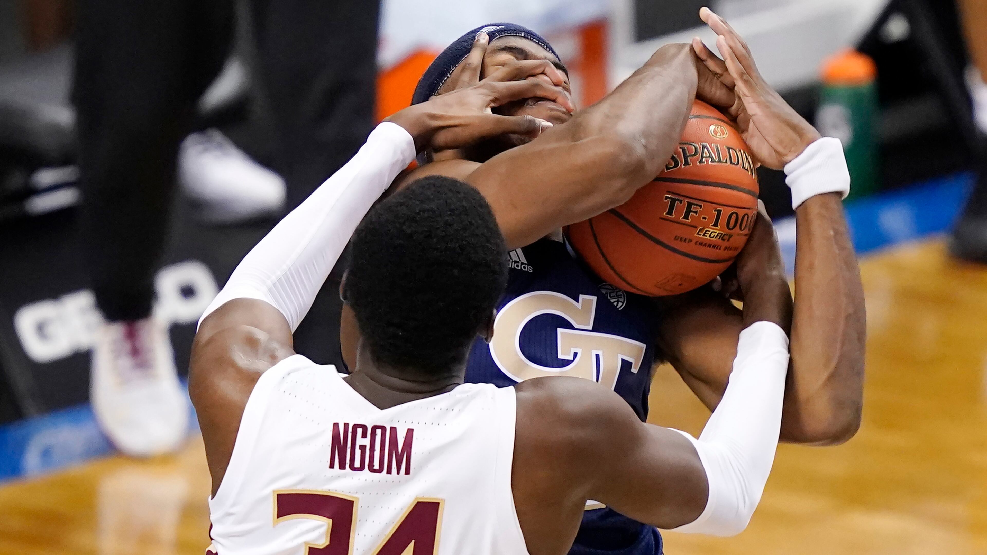 Florida State's Tanor Ngom (34) fouls Moses Wright of Georgia Tech during the second half of Saturday's ACC championship game.