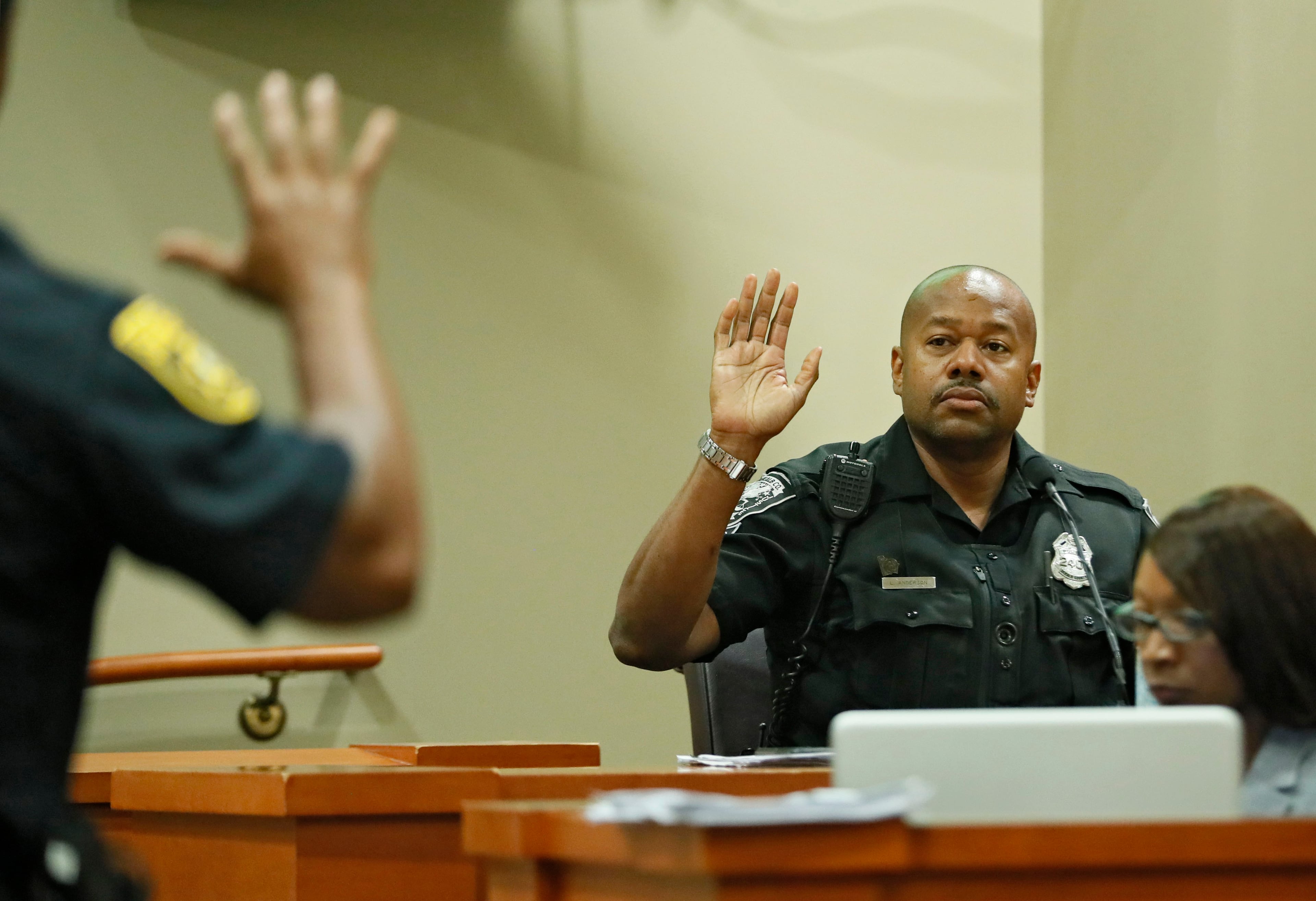 October 2, 2019 - Decatur - DeKalb Police Officer Lyn Anderson, who arrived at the scene shortly after the shooting, is sworn in. The murder trial of former DeKalb County police officer Robert "Chip" Olsen continued today. Olsen is charged with murdering war veteran Anthony Hill. Bob Andres / robert.andres@ajc.com