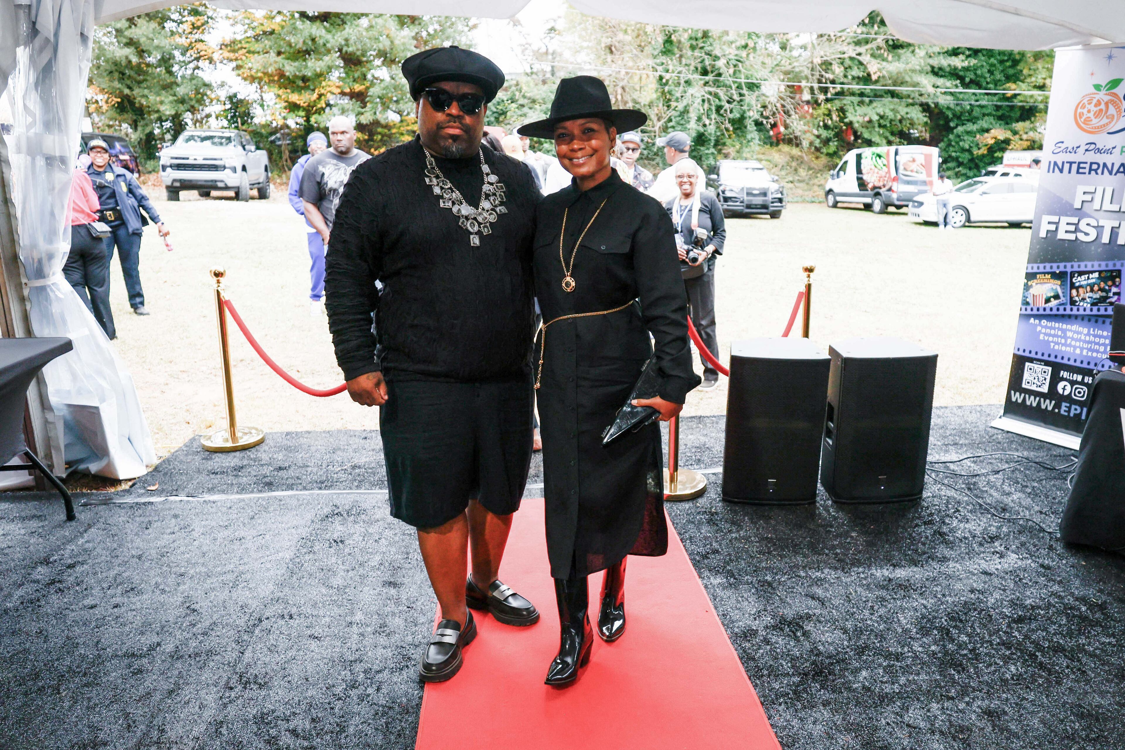 Former Goodie Mob member, singer, and songwriter CeeLo Green poses with his wife, Shani James, as they arrive in East Point to celebrate the life and legacy of Rico Wade on Thursday, Nov. 7, 2024.
(Miguel Martinez / AJC)