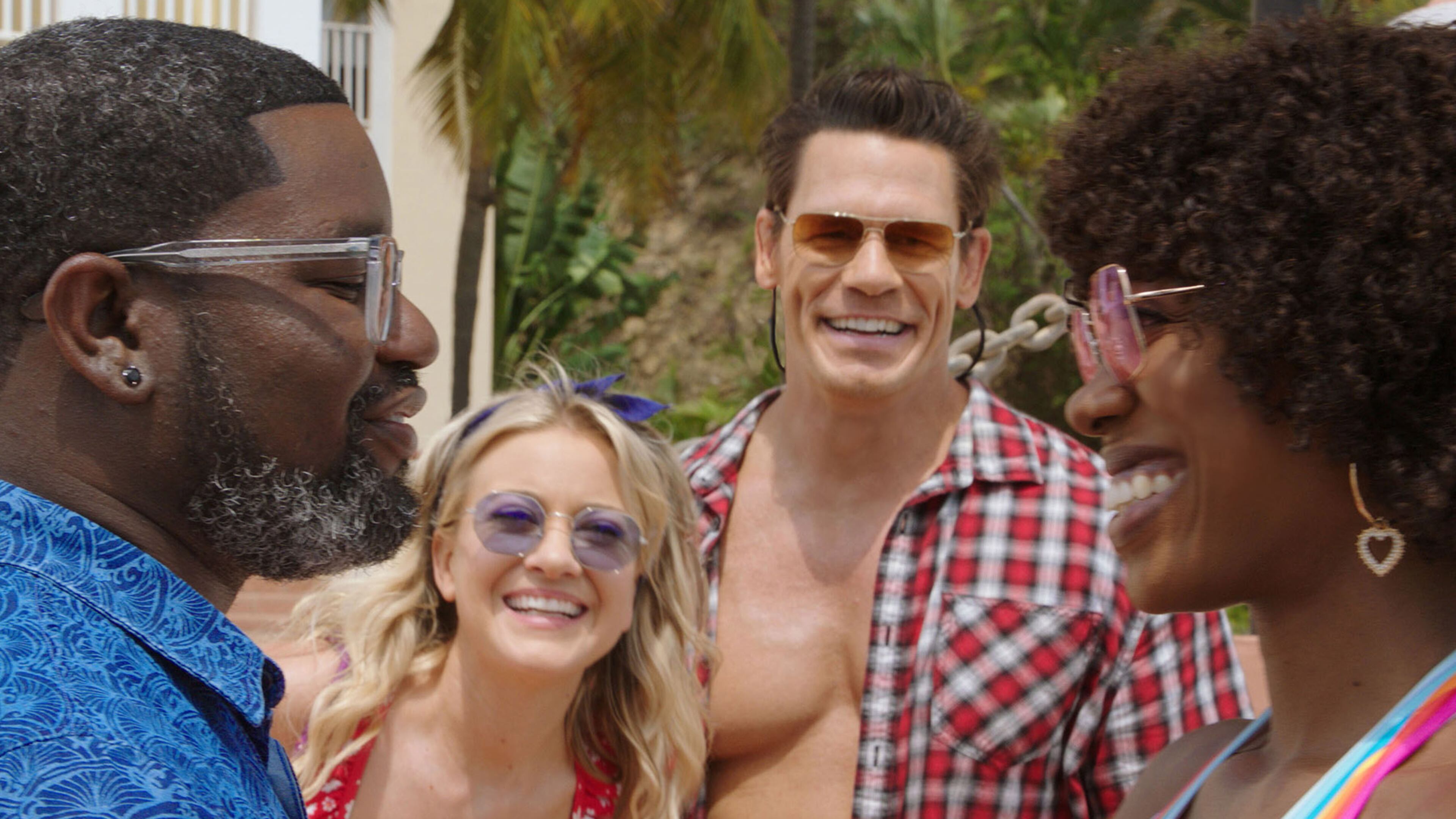 (From left) Lil Rel Howery as Marcus, Meredith Hagner as Kyla, John Cena as Ron and Yvonne Orji as Emily in 20th Century Studios’ "Vacation Friends," exclusively on Hulu. Photo courtesy of 20th Century Studios.