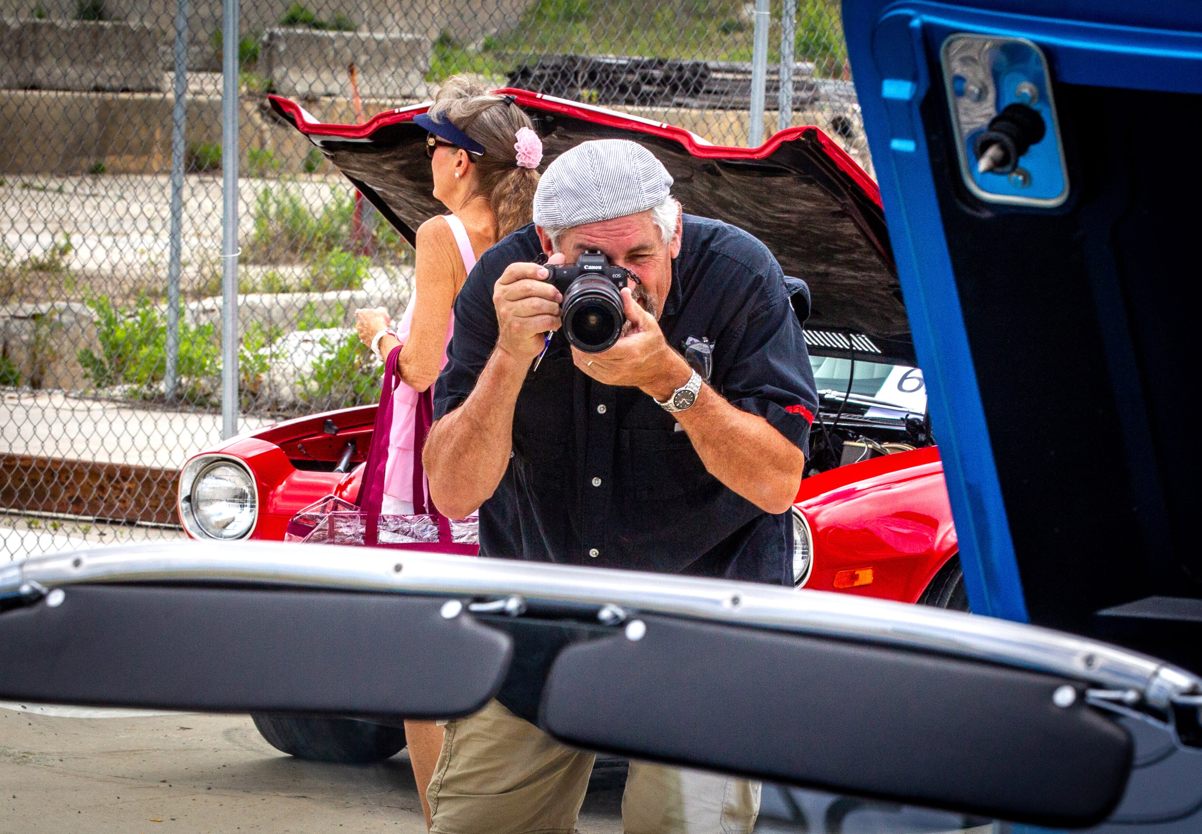 David Swanson takes a photograph of a 1959 Chevy during the Doraville Car Show along Assembly Line Drive on Saturday, June 26, 2021. Classic cars were featured on the grounds of the former General Motors plant as one of this year's events helping mark Doraville's sesquicentennial. (Photo: Steve Schaefer for The Atlanta Journal-Constitution)