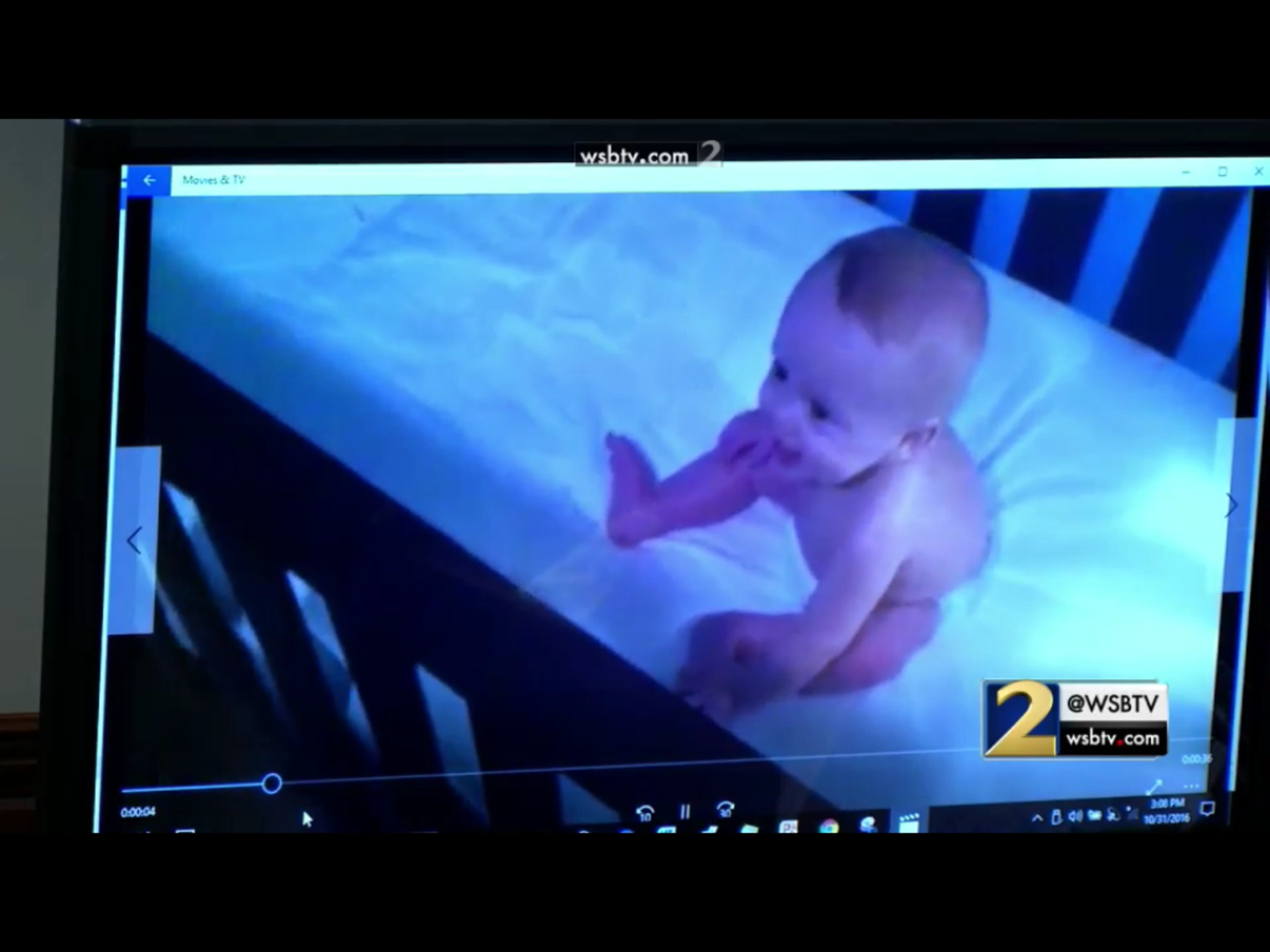 This family photo is one of dozens that Justin Ross Harris' defense team presented on Oct. 31, 2016 during Harris' murder trial. The image is taken from the WSB-TV live feed from the trial and some screen reflections may interfere with the photo. (screen capture via WSB-TV)