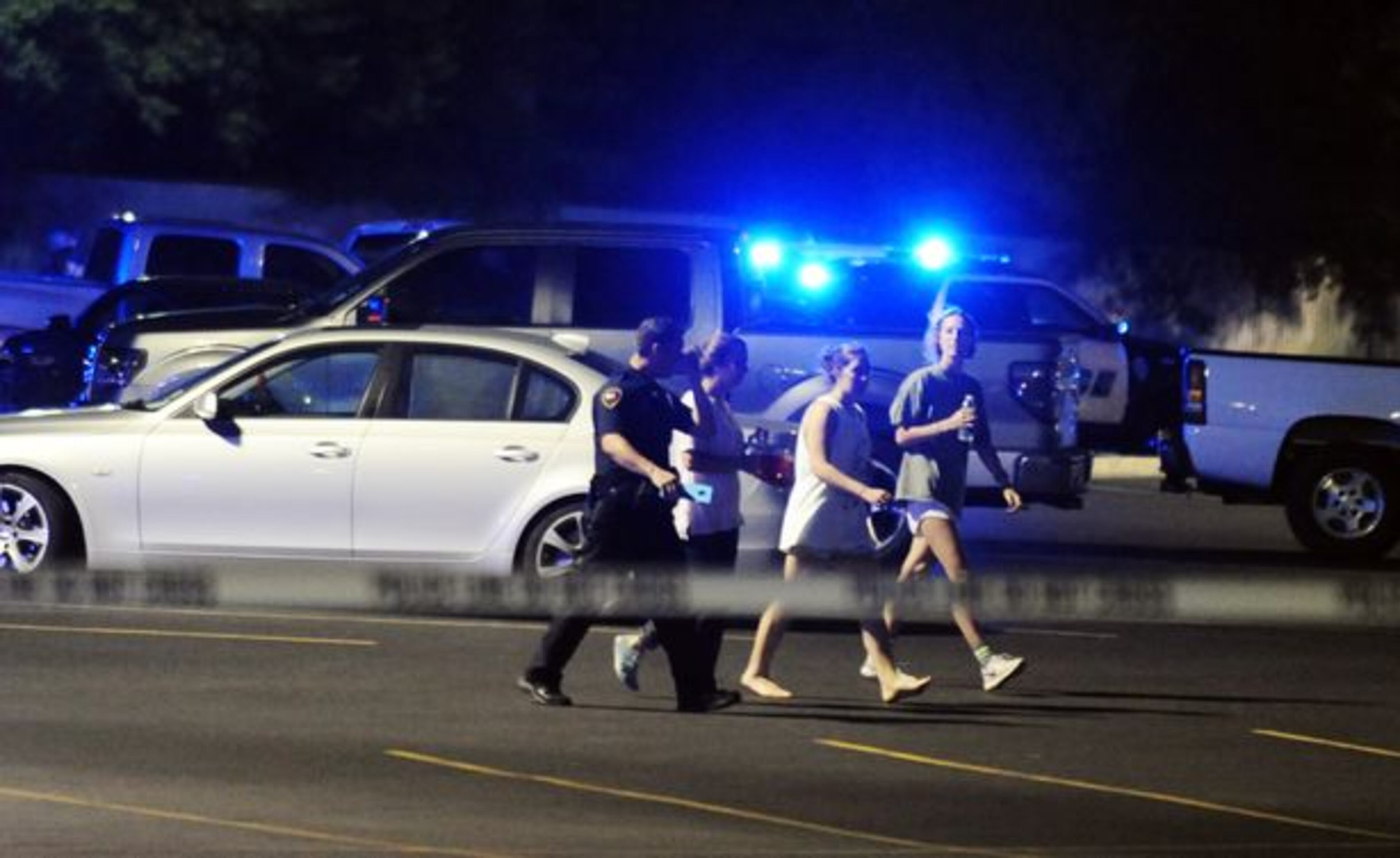 Police surround the scene following a shooting at a movie theater Thursday, July 23, 2015, in Lafayette, La. (AP)