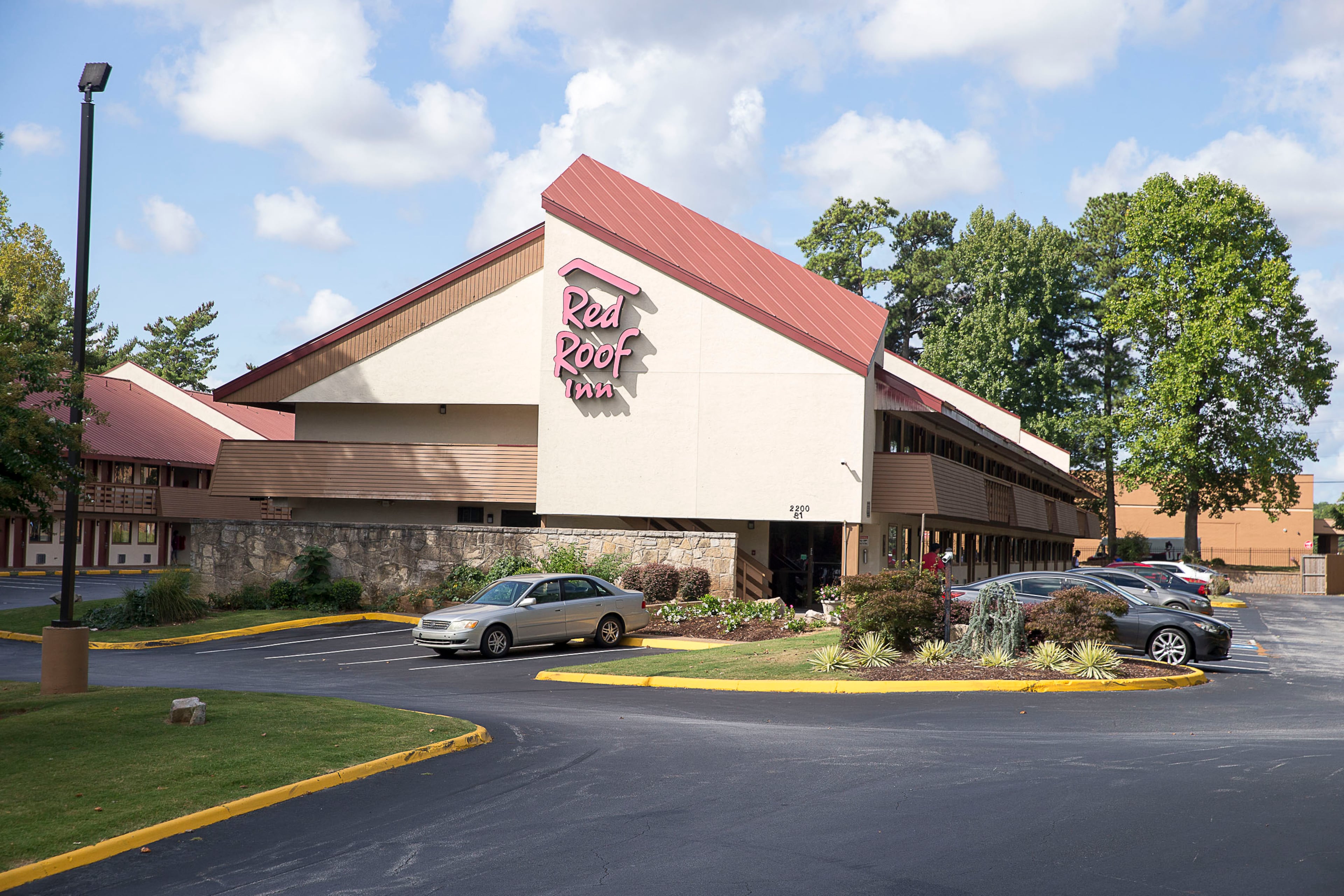 The exterior of the Red Roof Inn, located at 2200 Corporate Plaza SE in Smyrna, Friday, August 23, 2019. The Red Roof Inn in Smyrna is one of four metro-Atlanta hotels being sued for knowing sex trafficking was taking place, but doing nothing about it. (Alyssa Pointer/alyssa.pointer@ajc.com)