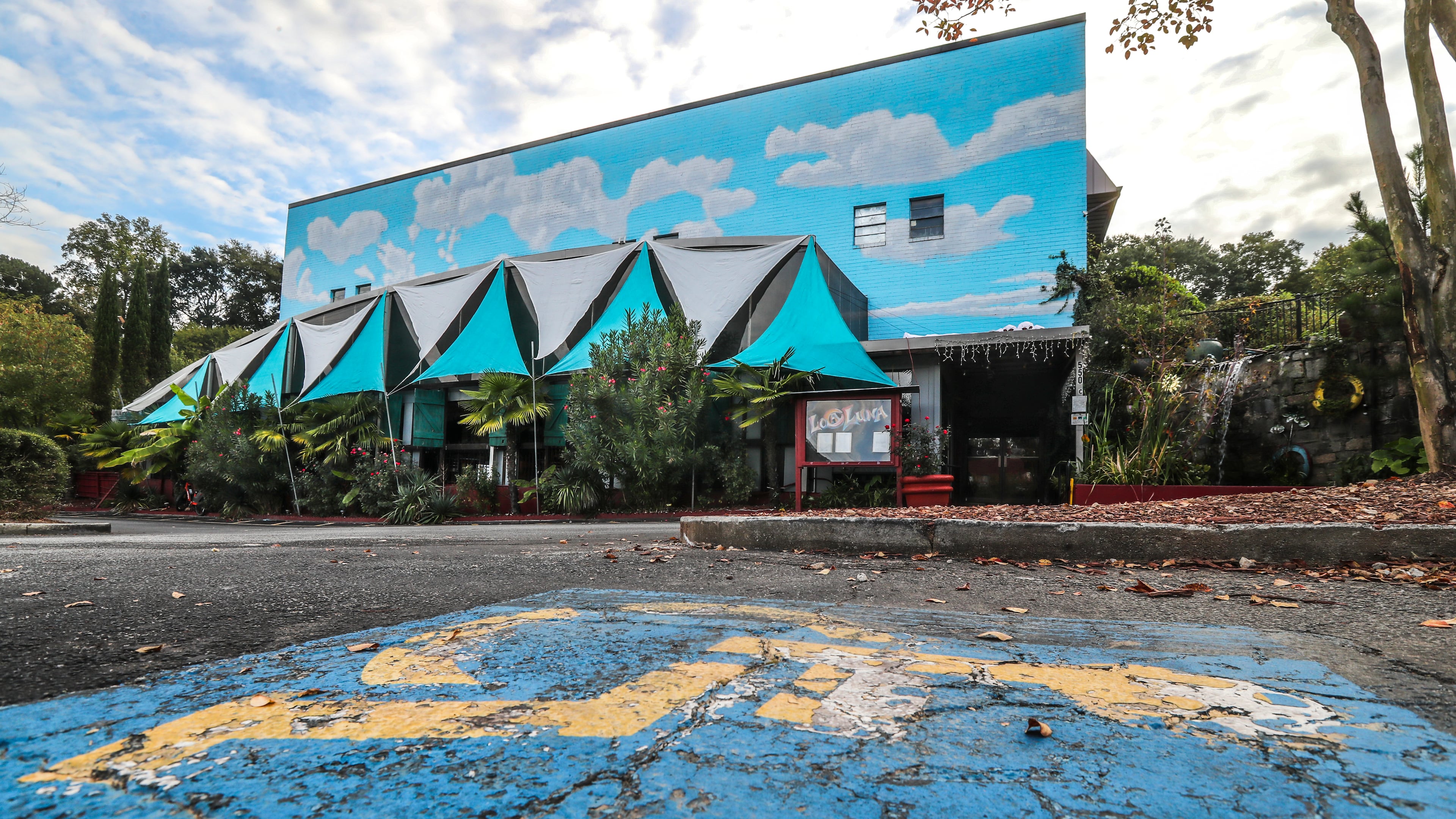 The sun rose Monday morning on the handicapped parking space where a man was killed overnight at Loca Luna on Amsterdam Avenue. According to Atlanta police, the victim was shot after arguing with someone who was leaning on his orange Jaguar coupe.