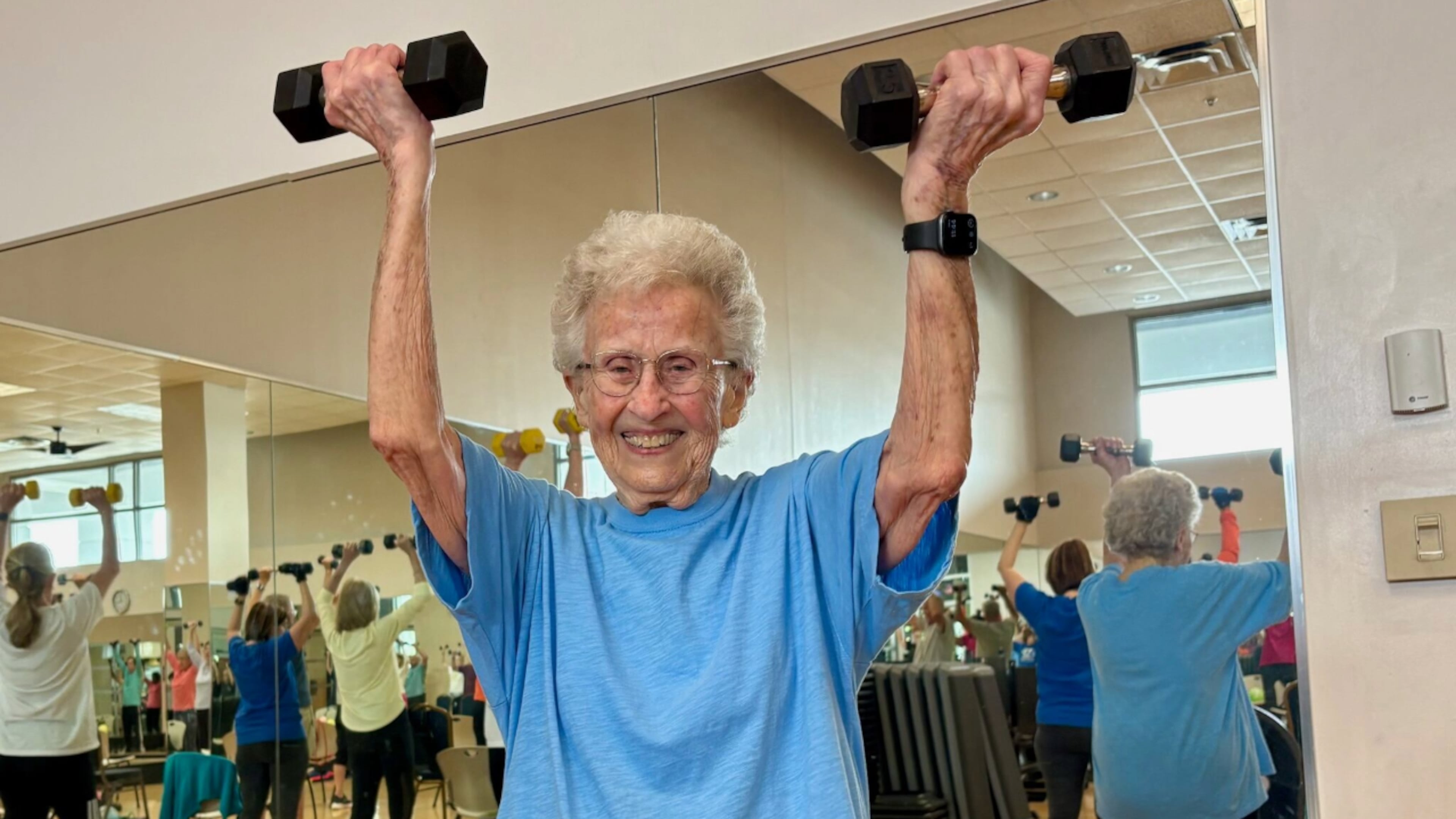 Betty Lindberg, 101, hoists dumbbells during a workout at LA Fitness in Buckhead earlier this month. Lindberg has completed 35 Peachtree Road Races. (Ken Sugiura/AJC)