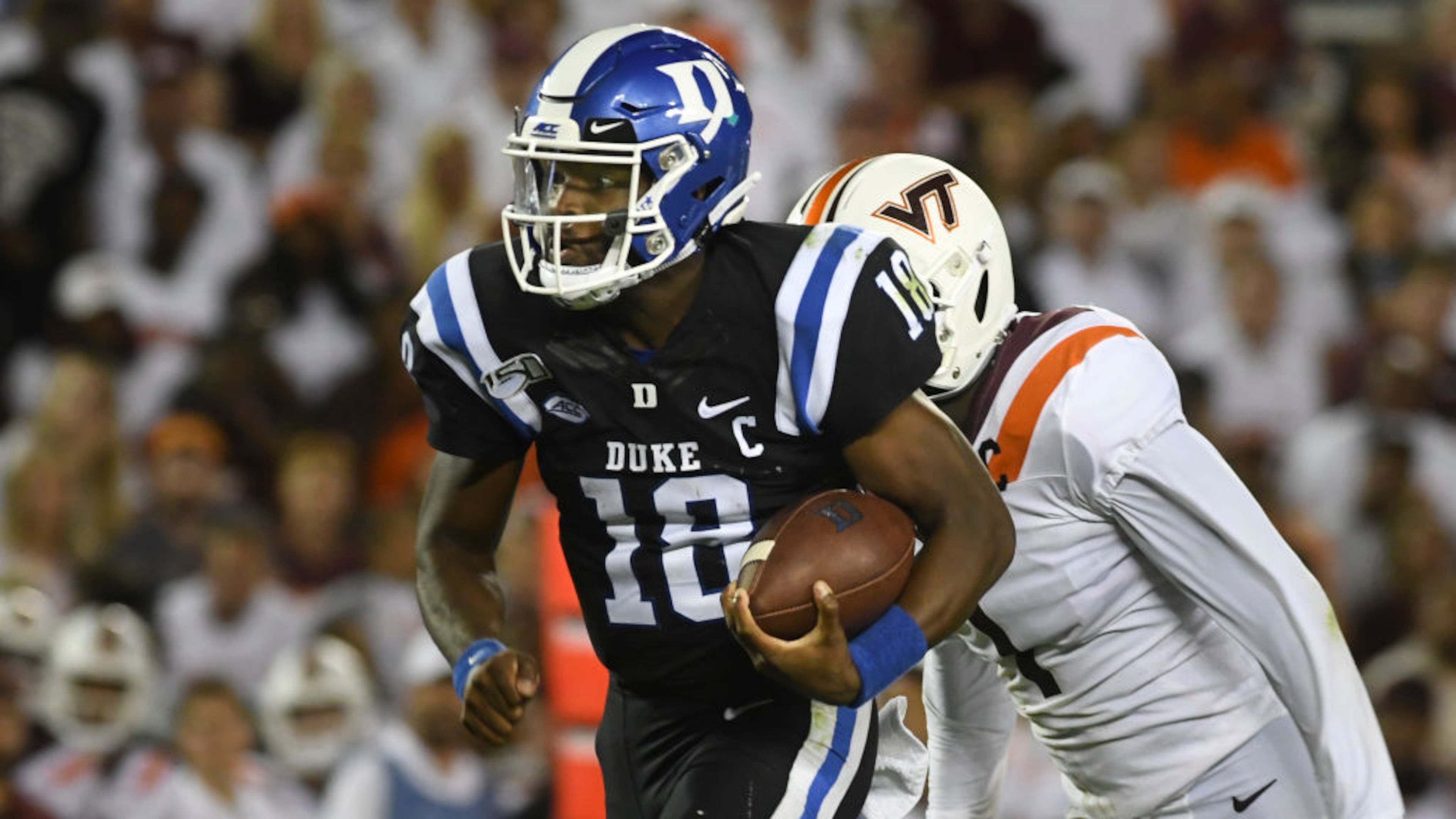 BLACKSBURG, VA - SEPTEMBER 27: Quarterback Quentin Harris #18 of the Duke Blue Devils rushes during a long touchdown run against the Virginia Tech Hokies at Lane Stadium on September 27, 2019 in Blacksburg, Virginia. (Photo by Michael Shroyer/Getty Images)