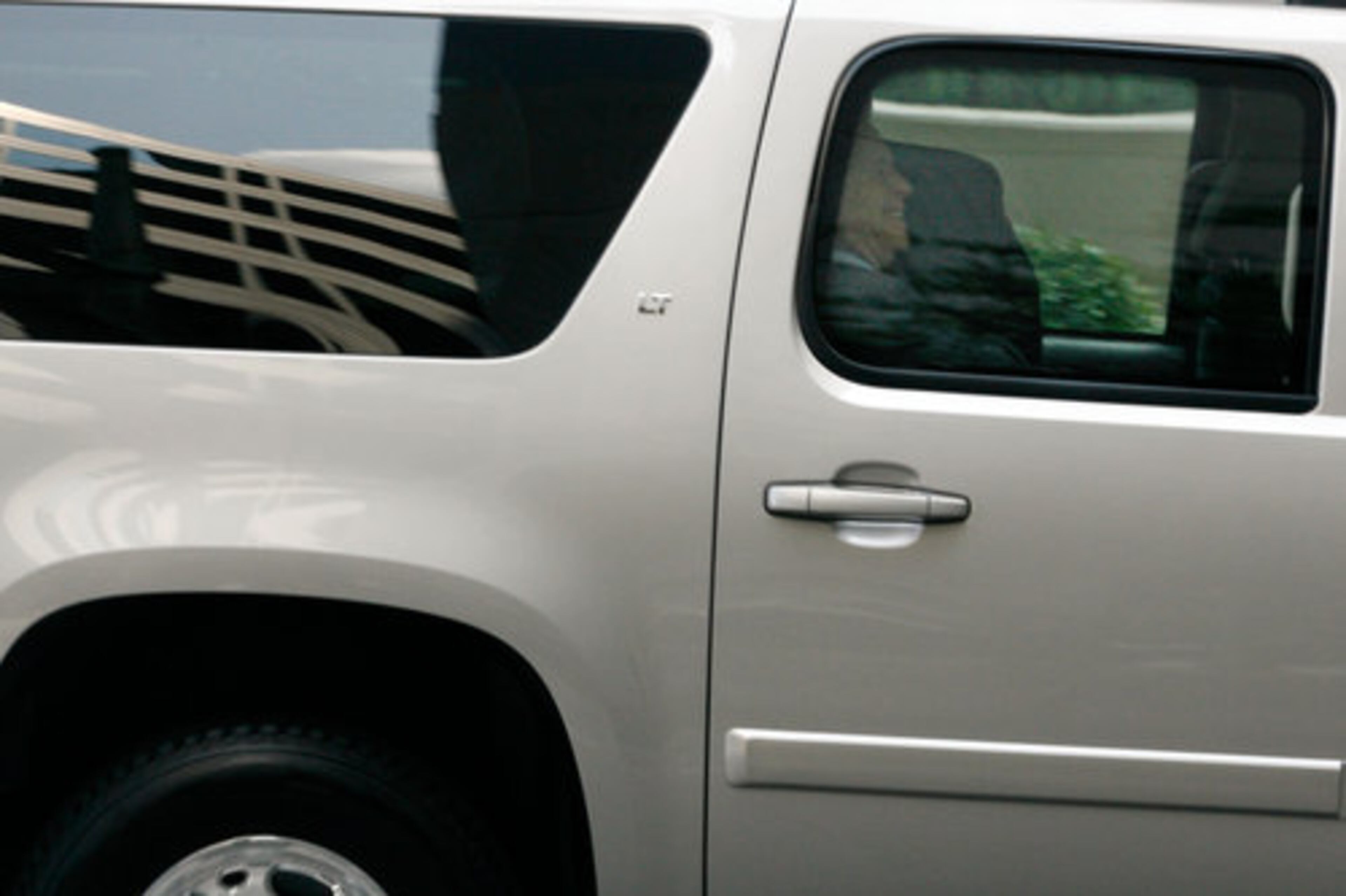 John McCain arrives at the back entrance to the Marriott Marquis.